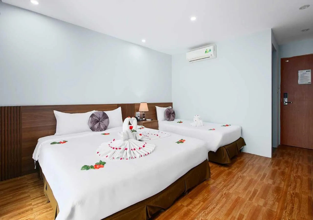 Photo of the whole room, Bed in Family Hanoi Hotel