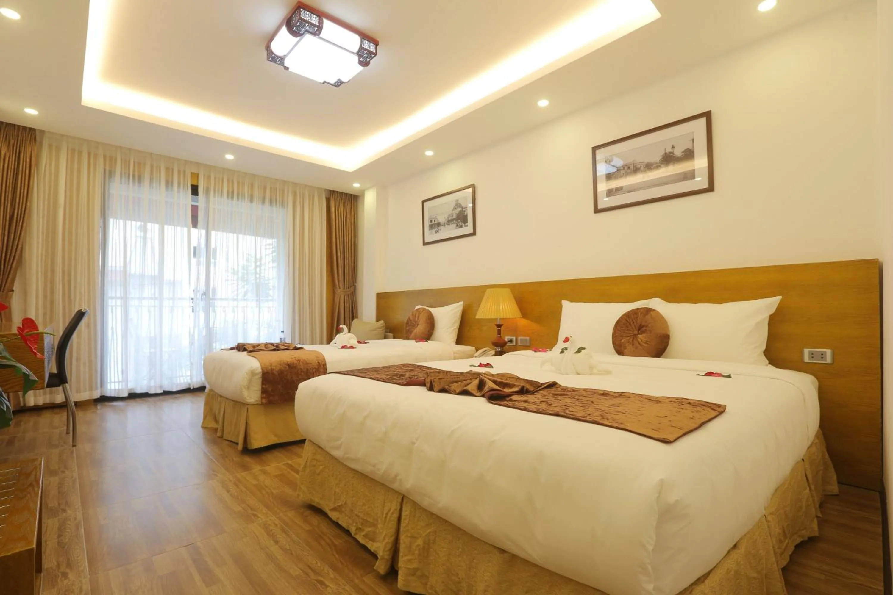 Photo of the whole room, Bed in Family Hanoi Hotel