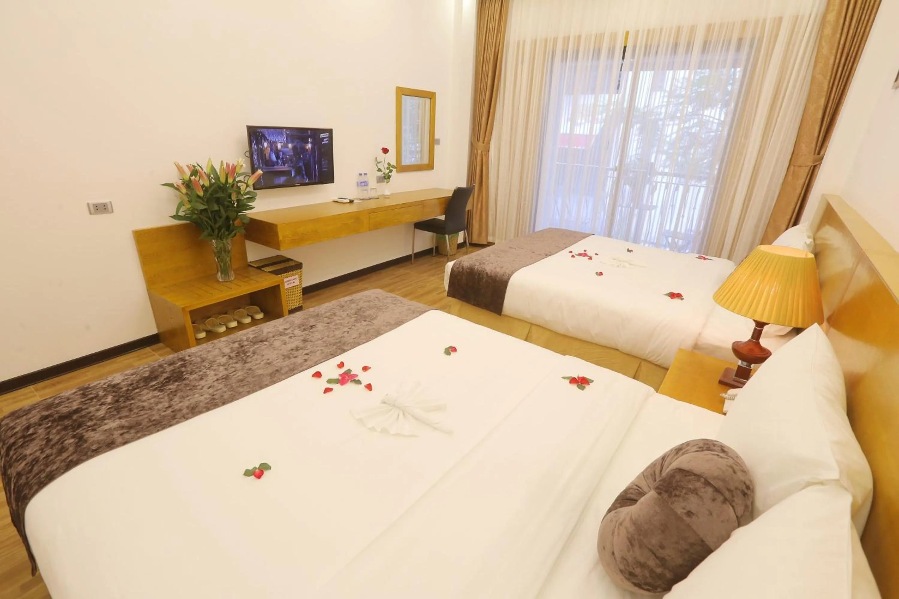 Photo of the whole room, Bed in Family Hanoi Hotel
