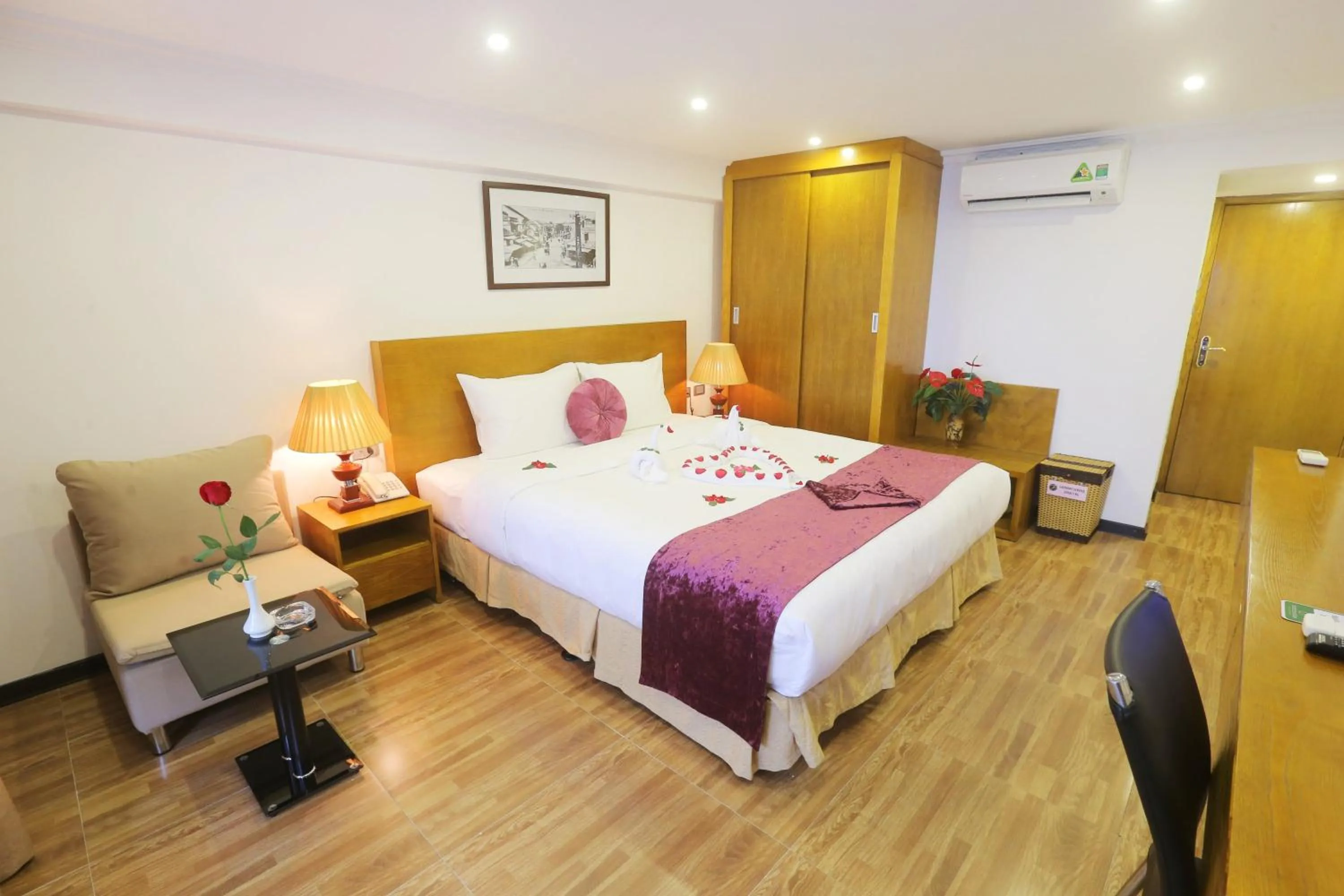 Photo of the whole room, Bed in Family Hanoi Hotel