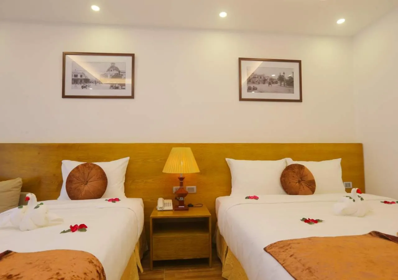 Photo of the whole room, Bed in Family Hanoi Hotel