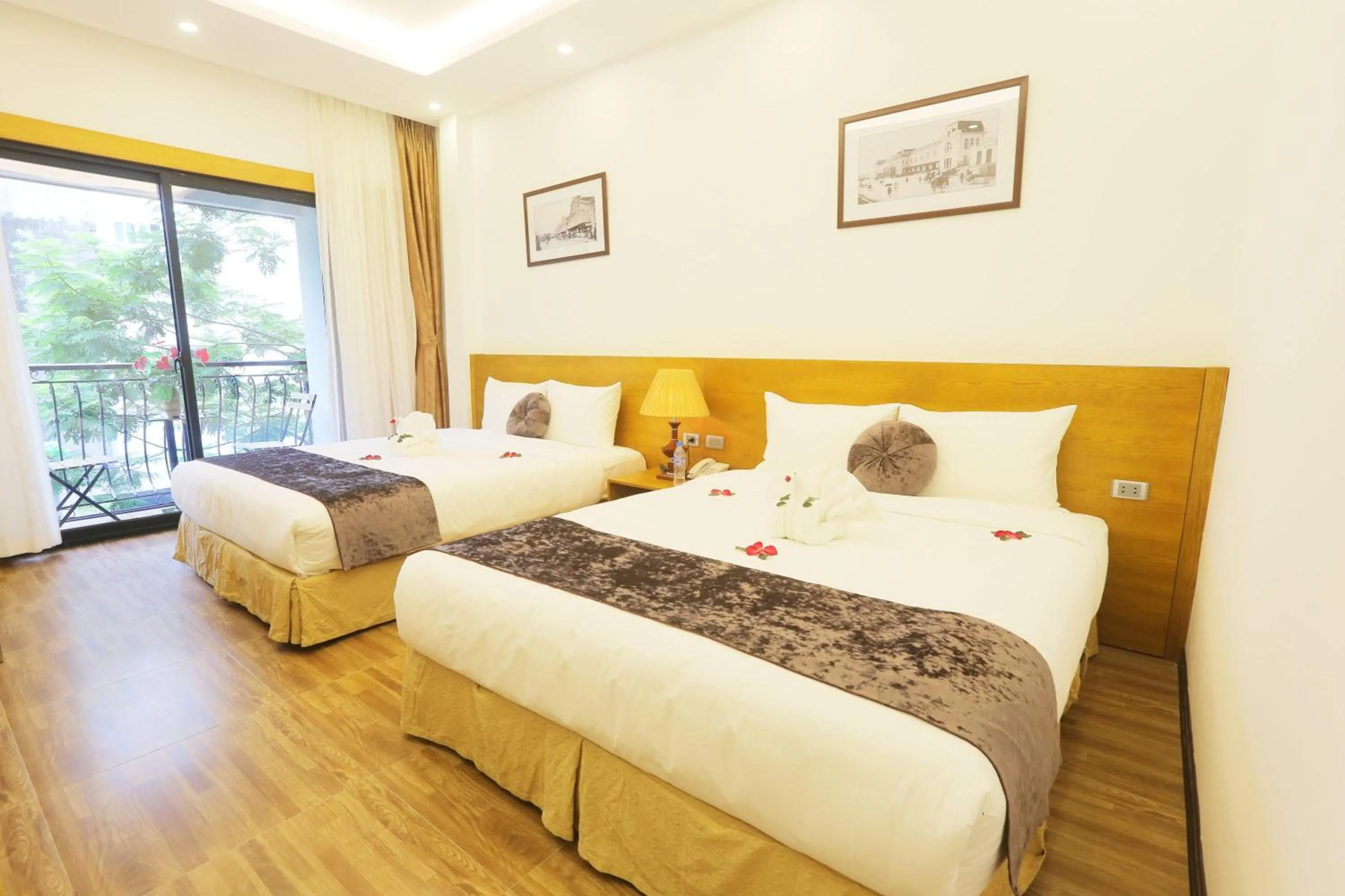 Photo of the whole room, Bed in Family Hanoi Hotel