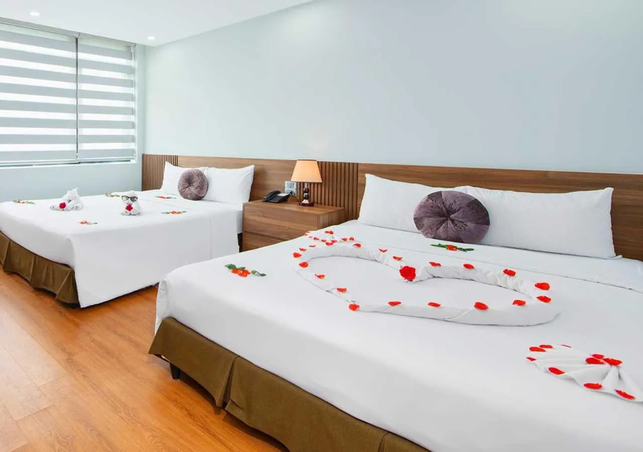 Photo of the whole room, Bed in Family Hanoi Hotel