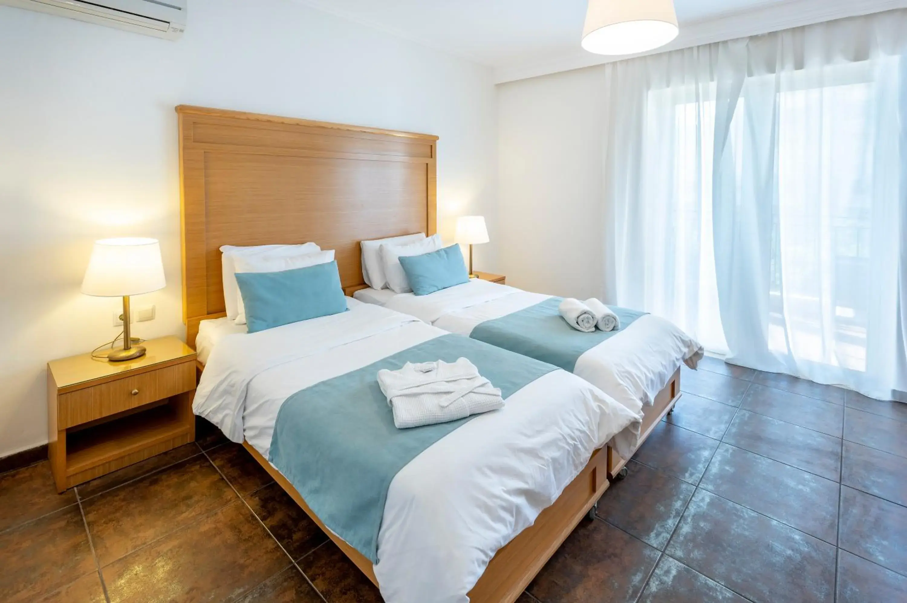 Bed in Peridis Family Resort Bed in Peridis Family Resort