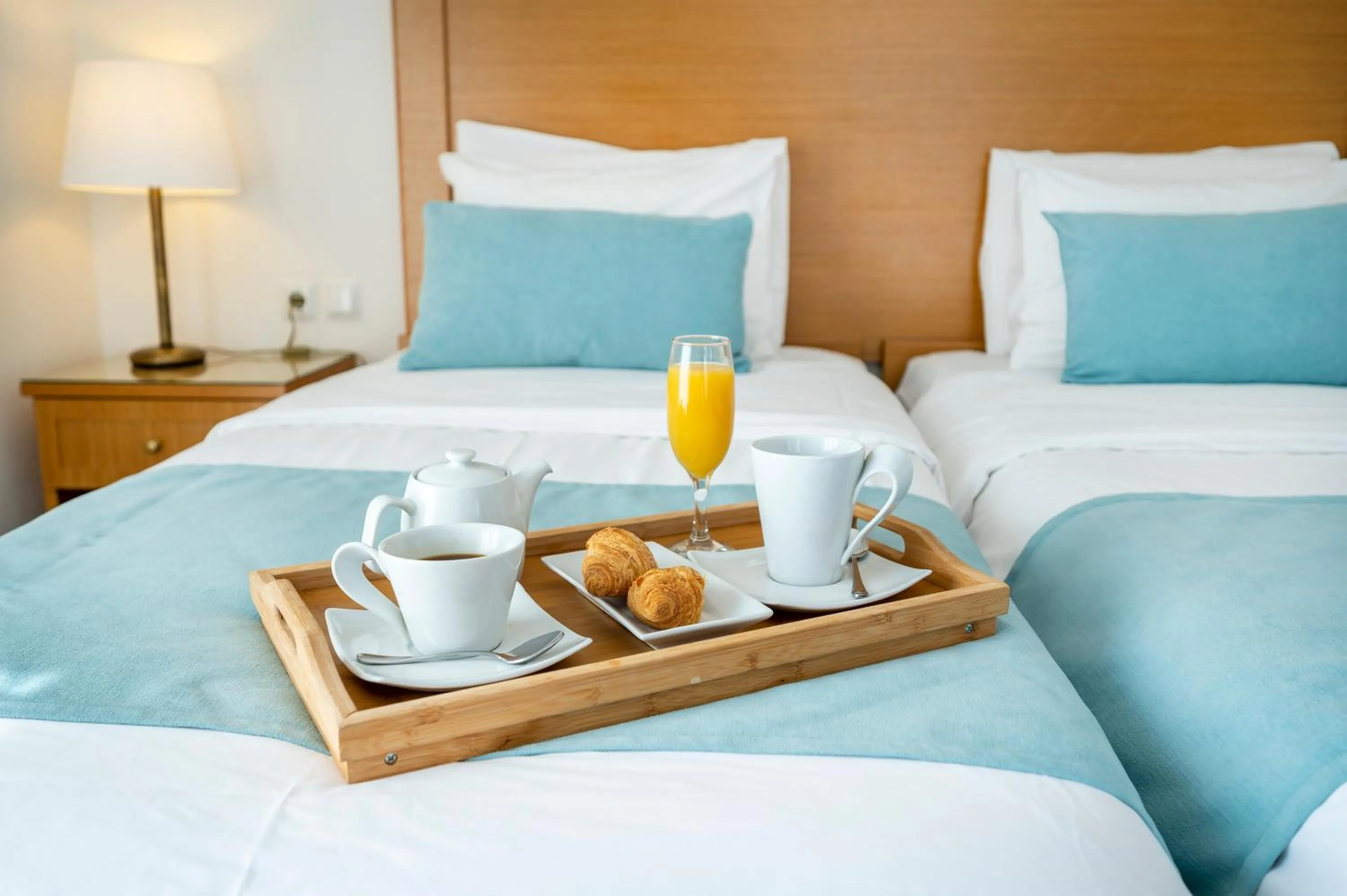 Bed in Peridis Family Resort