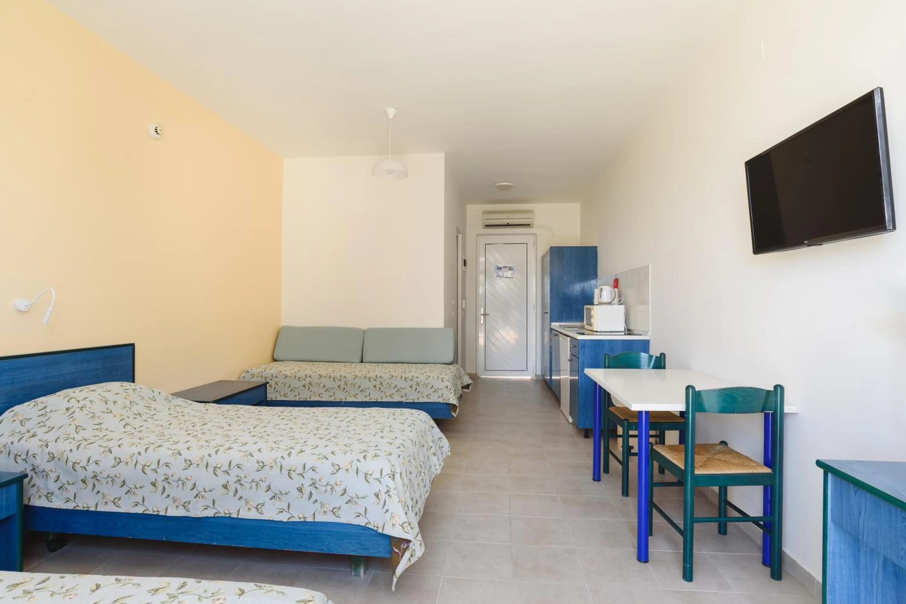 Bed in Matina Pefkos Aparthotel