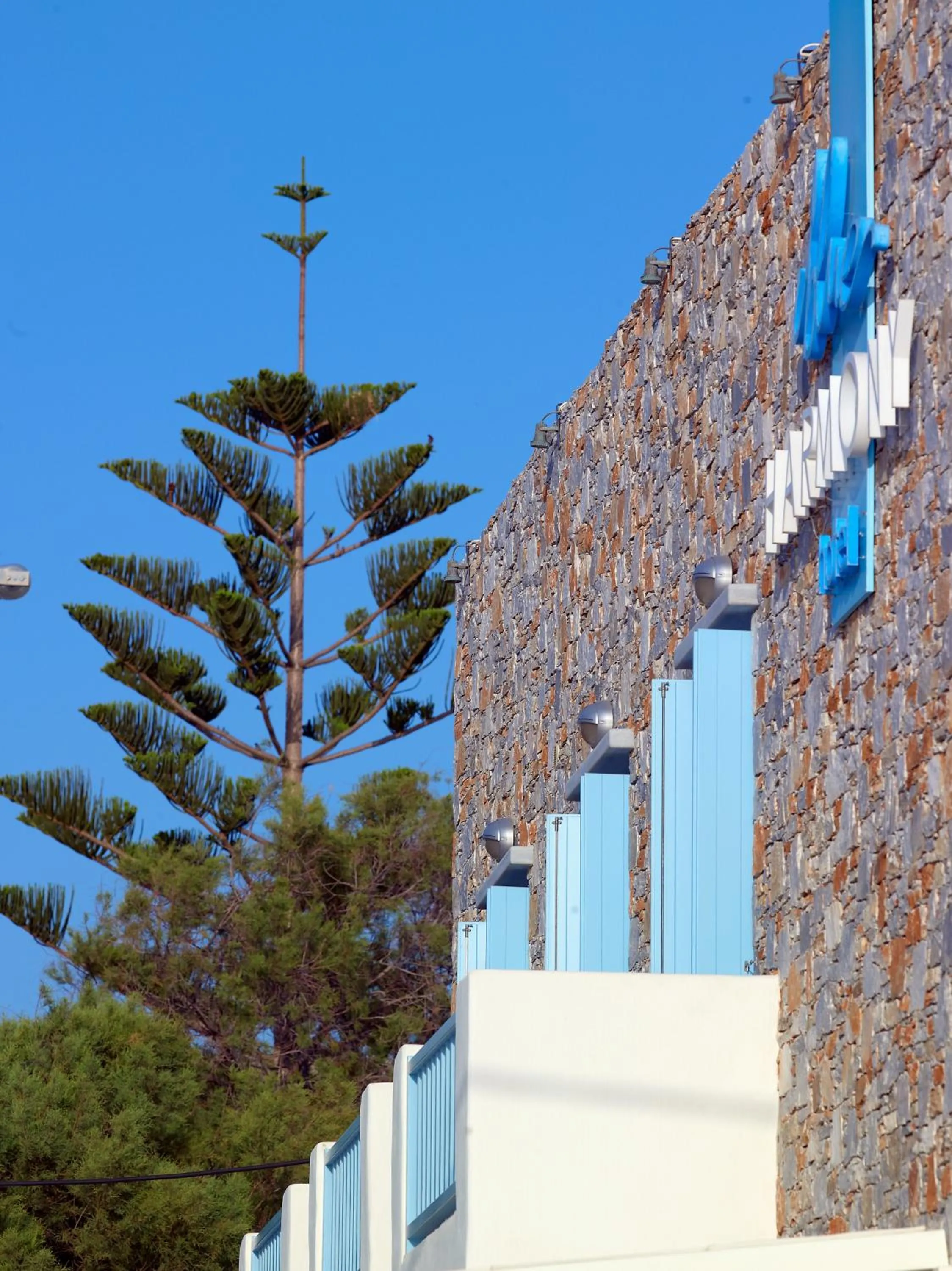 Property logo or sign in Blue Harmony Hotel