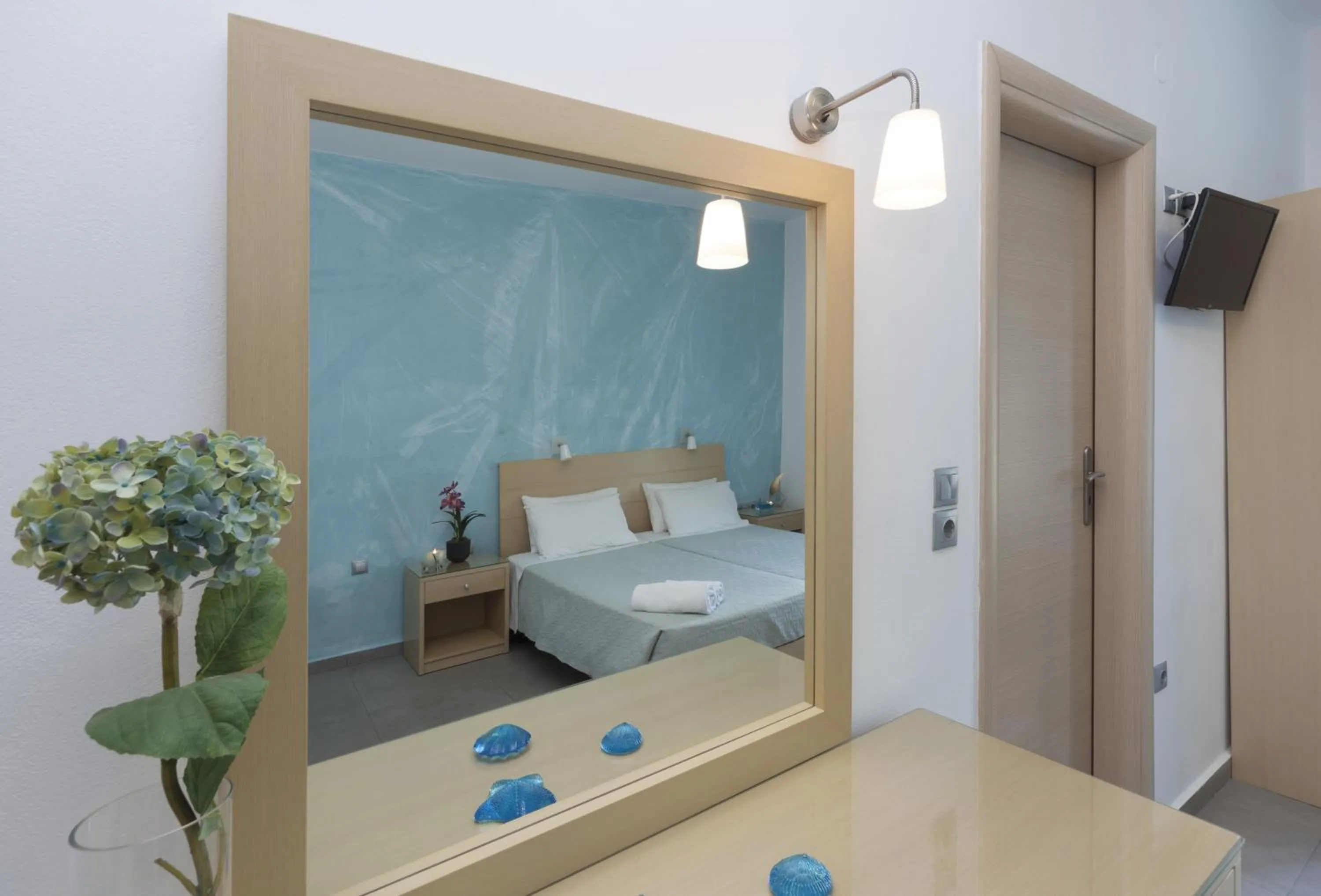 Decorative detail, Bed in Blue Harmony Hotel