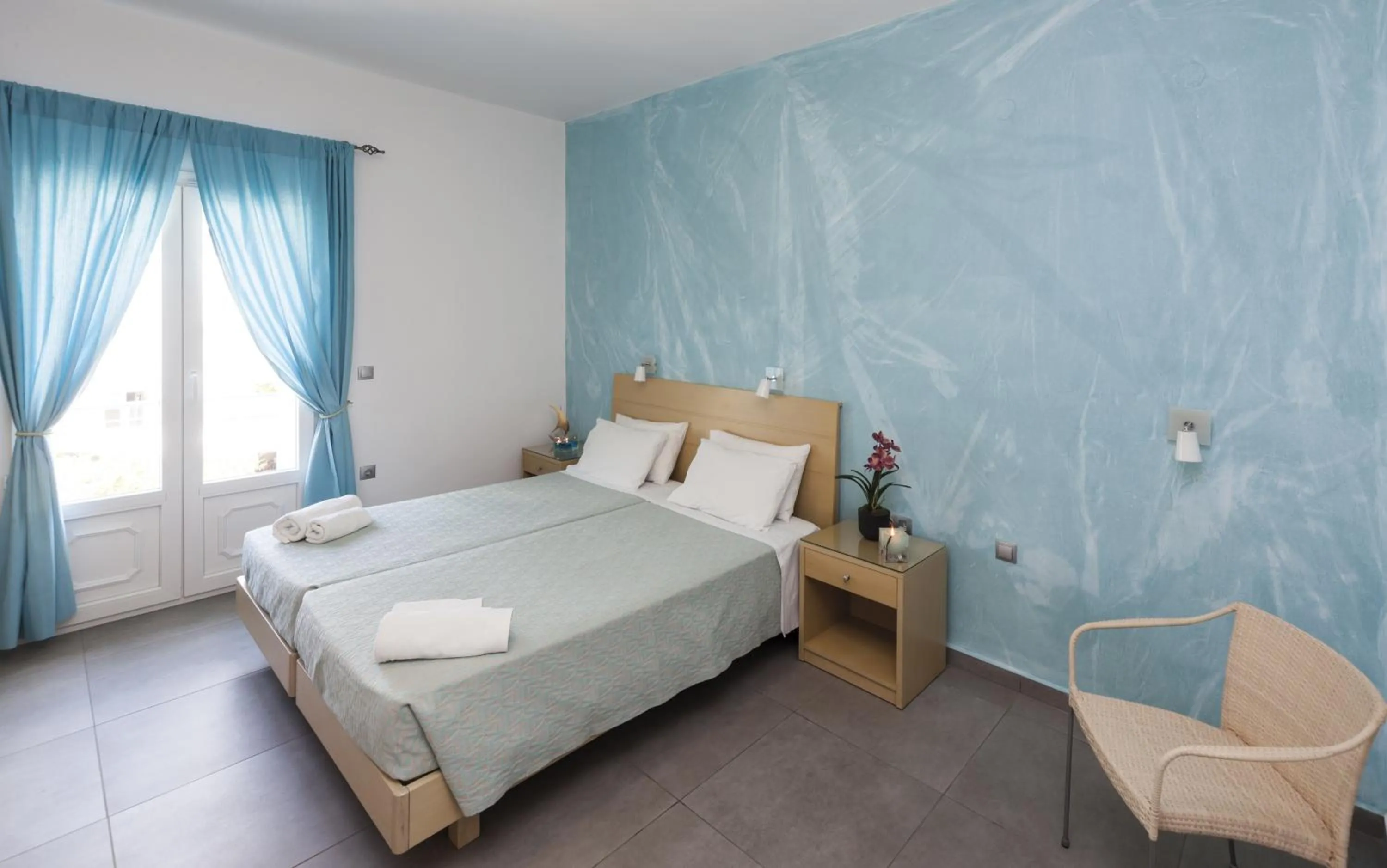 Bed in Blue Harmony Hotel
