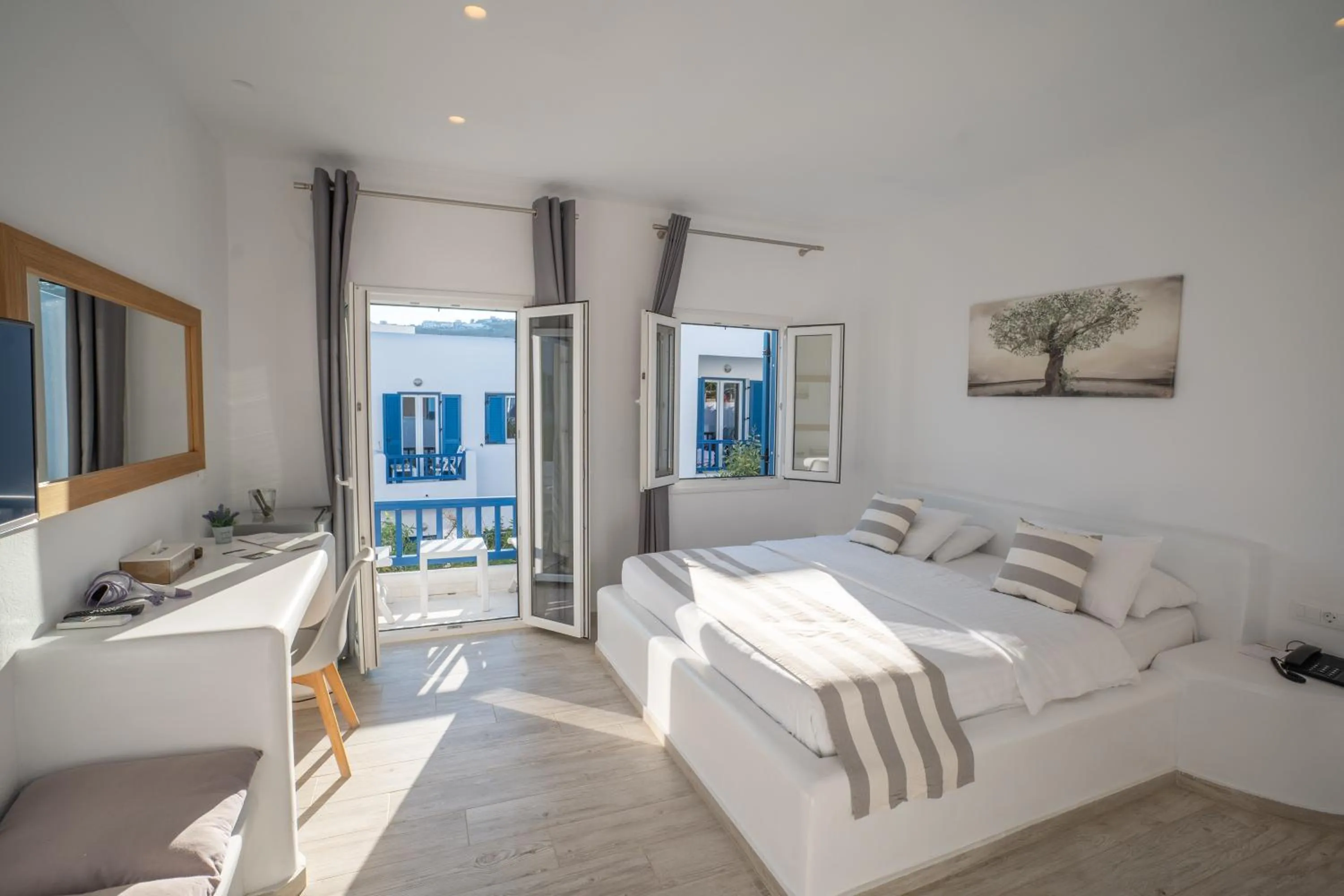 Photo of the whole room, Bed in Acrogiali Beachfront Hotel Mykonos