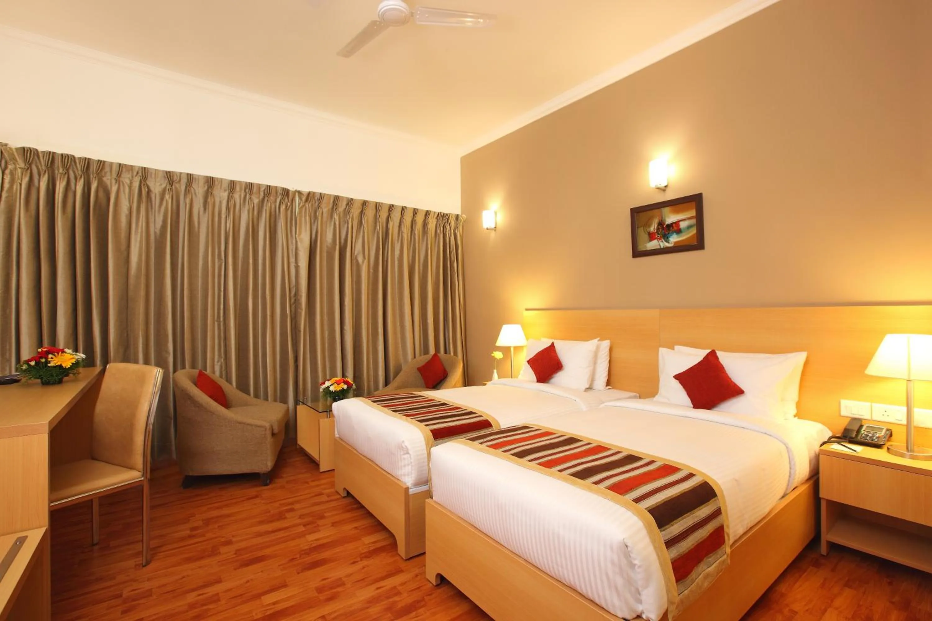 Bed in Starlit Suites Kochi