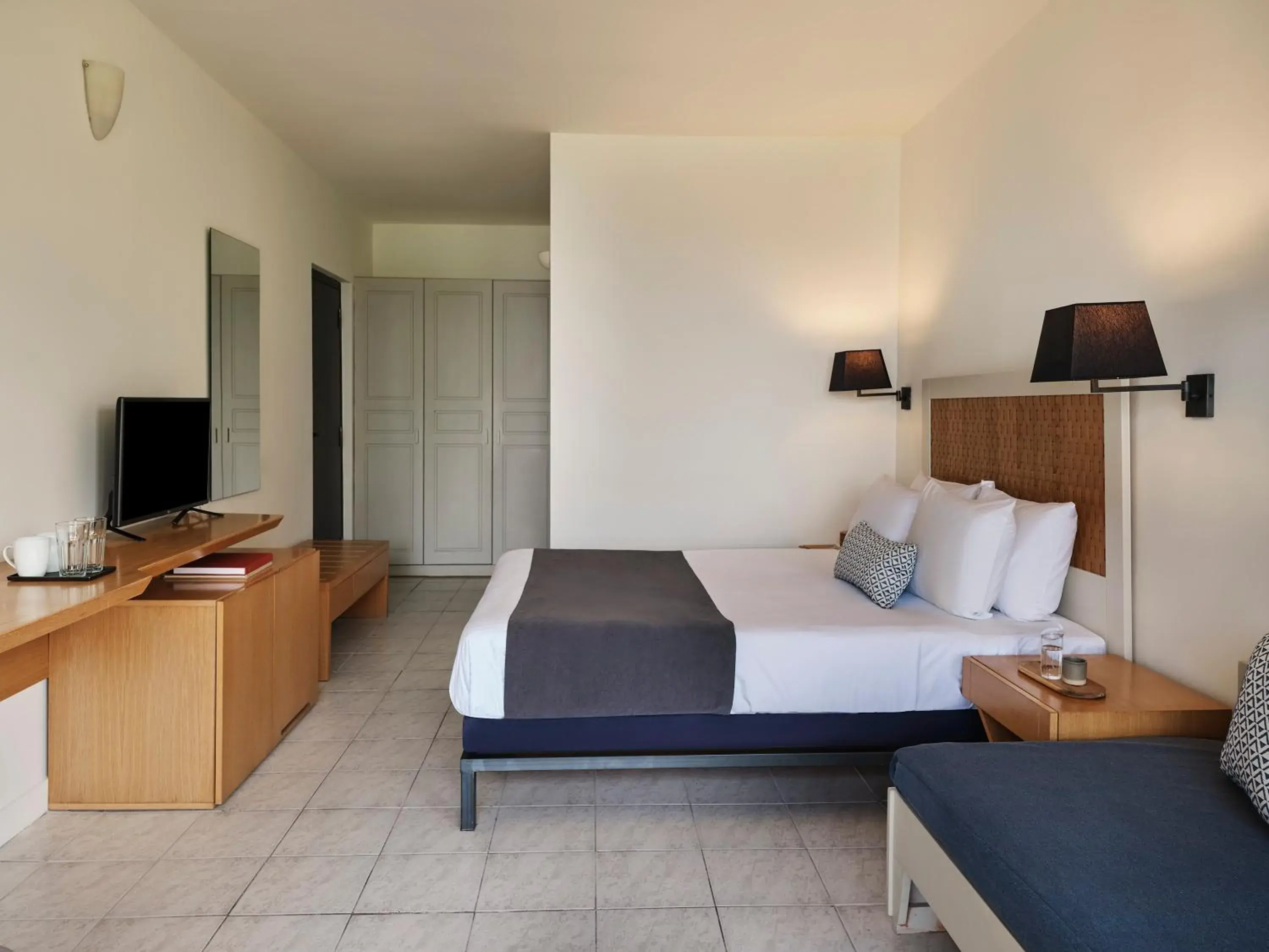 Bed in Aeolos Beach Resort Bed in Aeolos Beach Resort