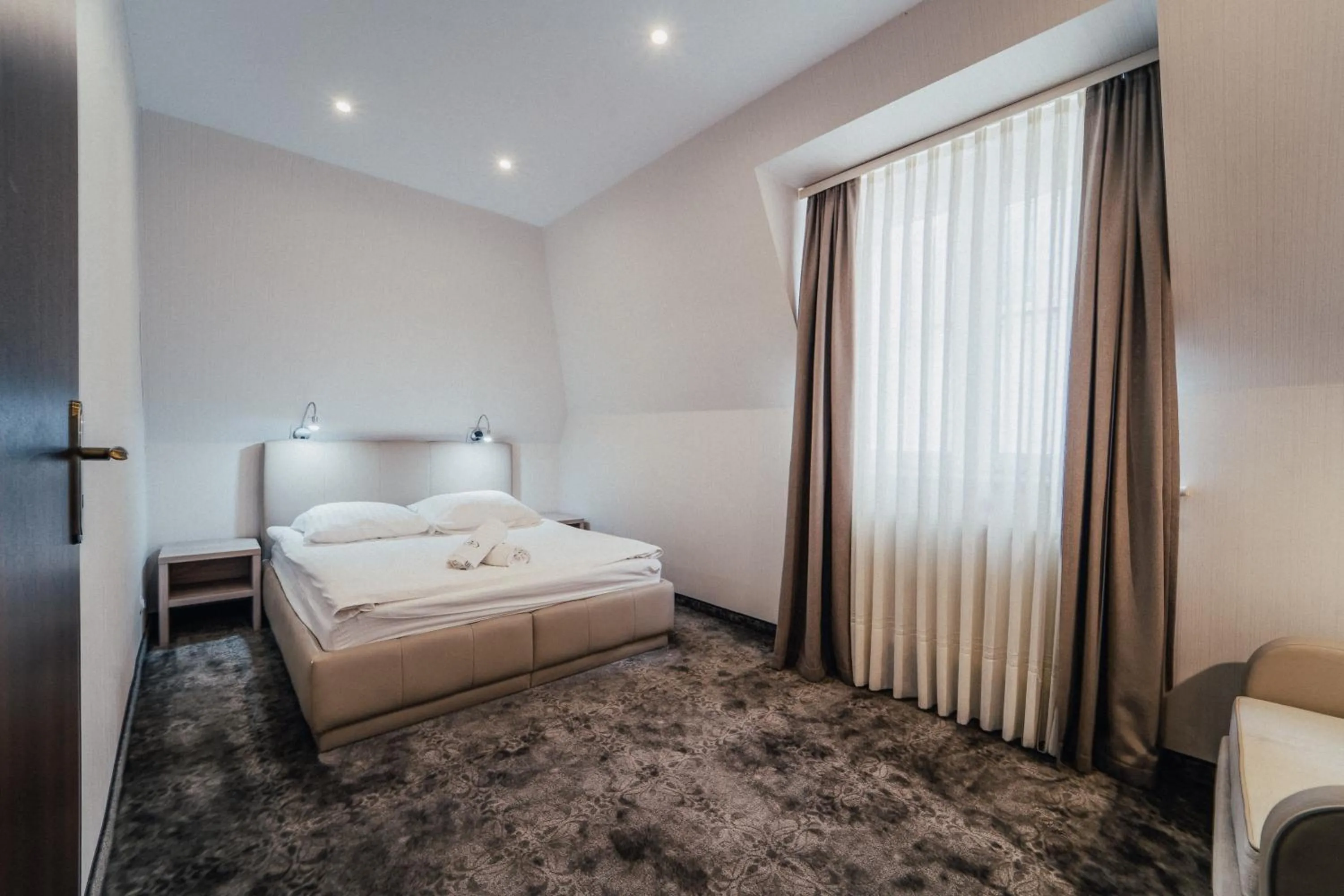 Bed in Hotel Jantar Wellness & Spa