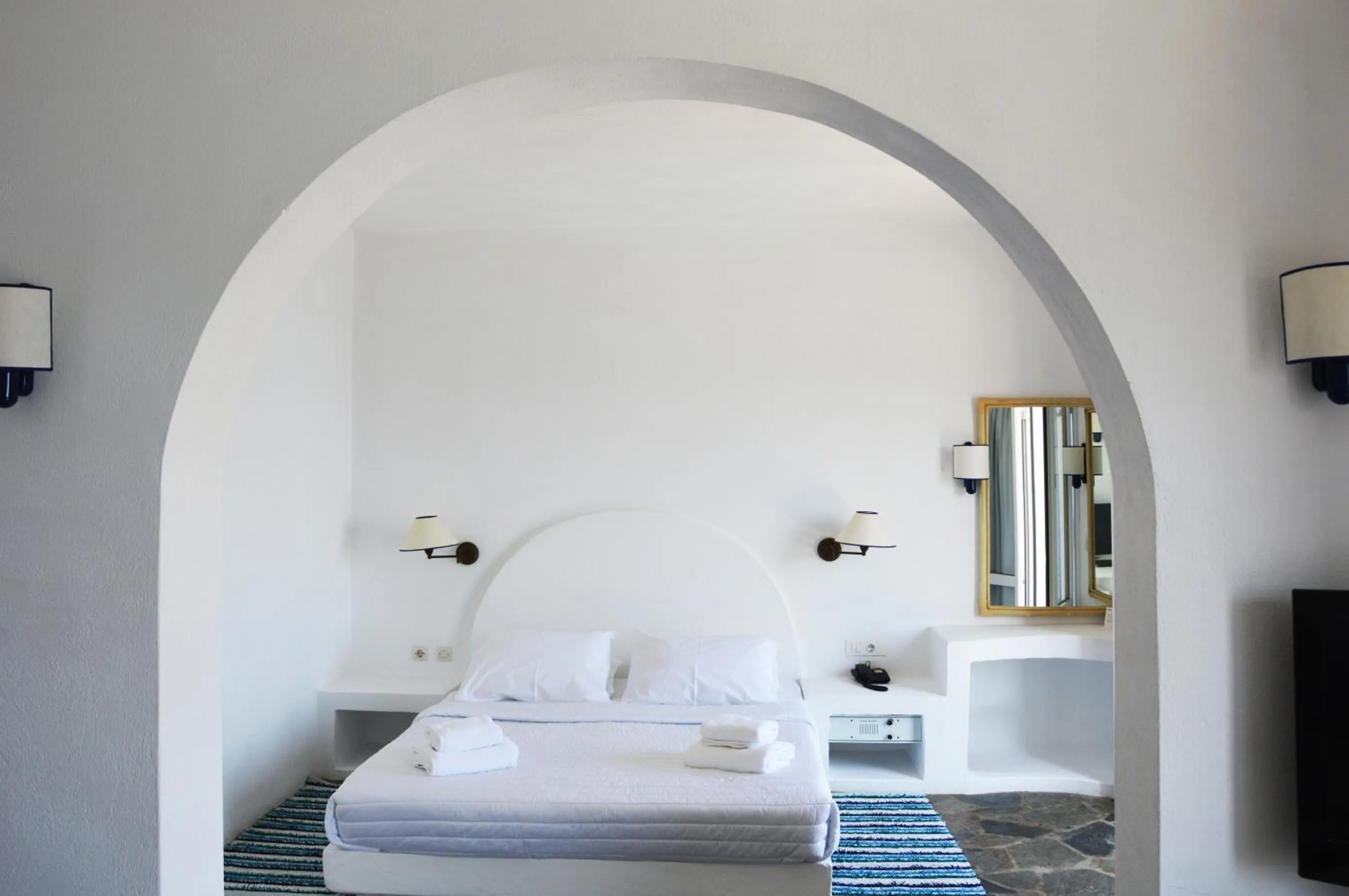 Bed in Patmos Paradise Hotel