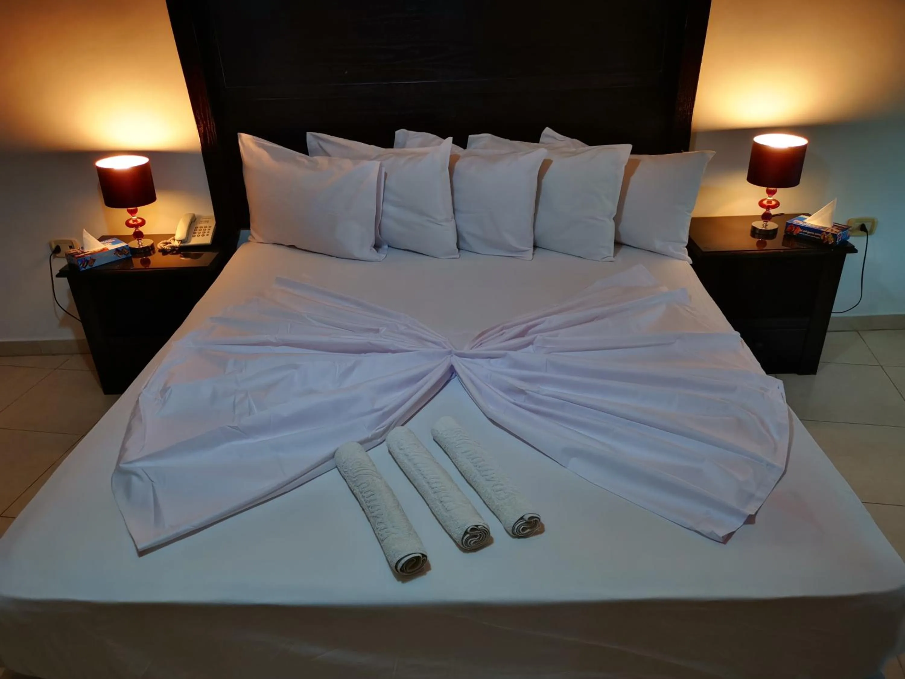 Bed in Al Fakher Hotel Apartments & Suites