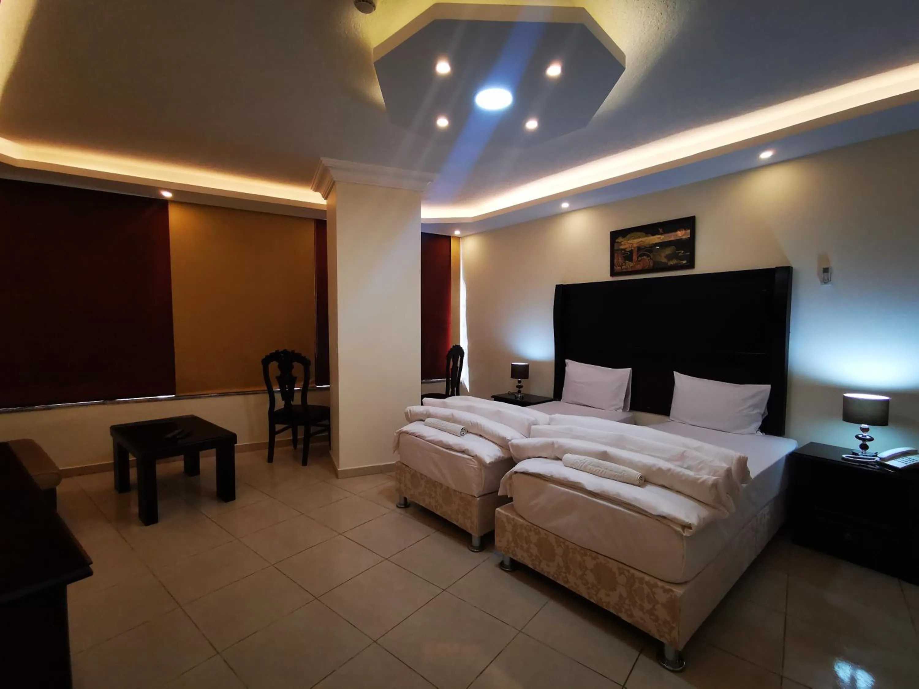Bed in Al Fakher Hotel Apartments & Suites