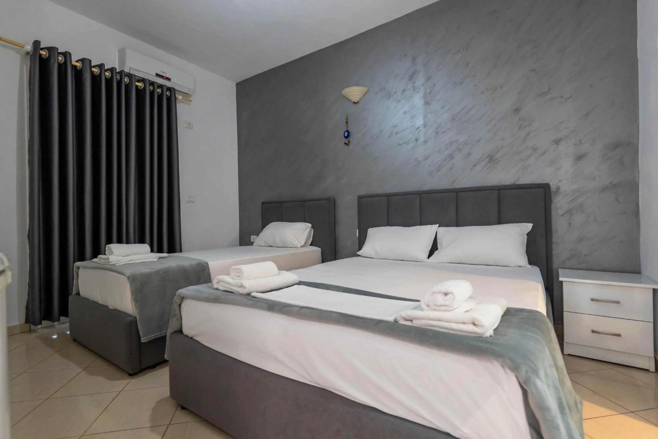 Bed in Hotel Two Mermaids Ksamil