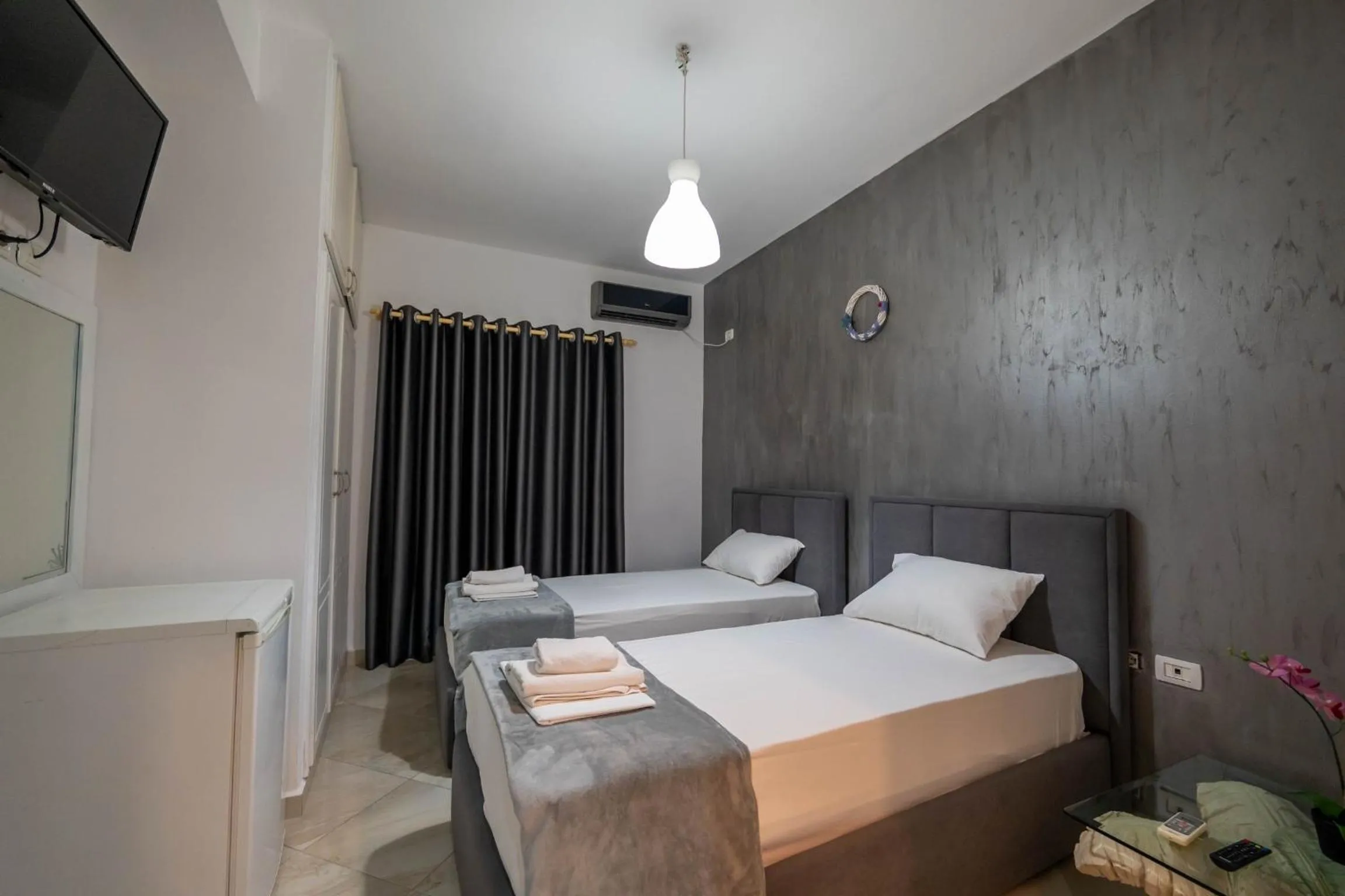 Bed in Hotel Two Mermaids Ksamil