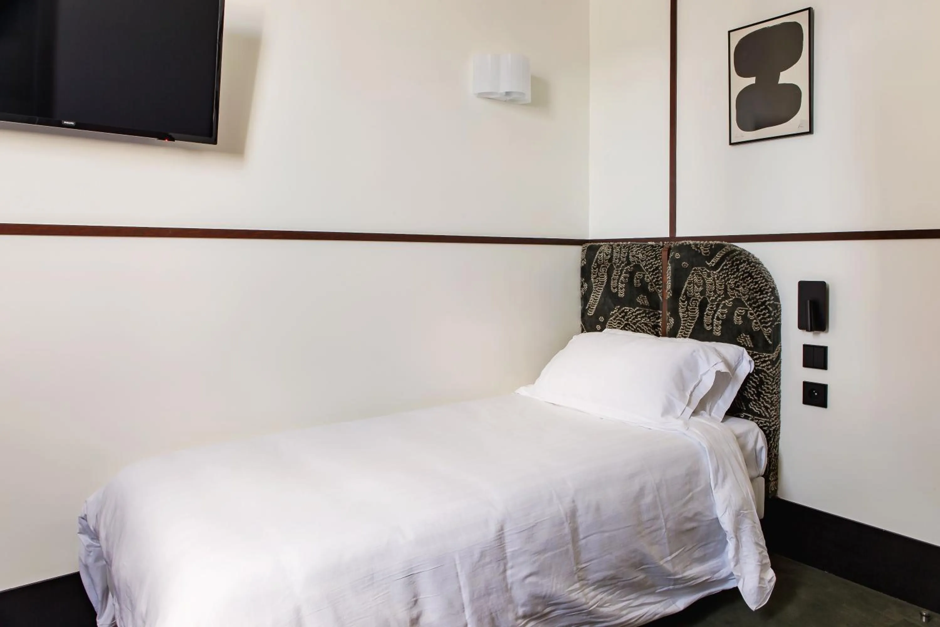 Bed in Hôtel Marguerite