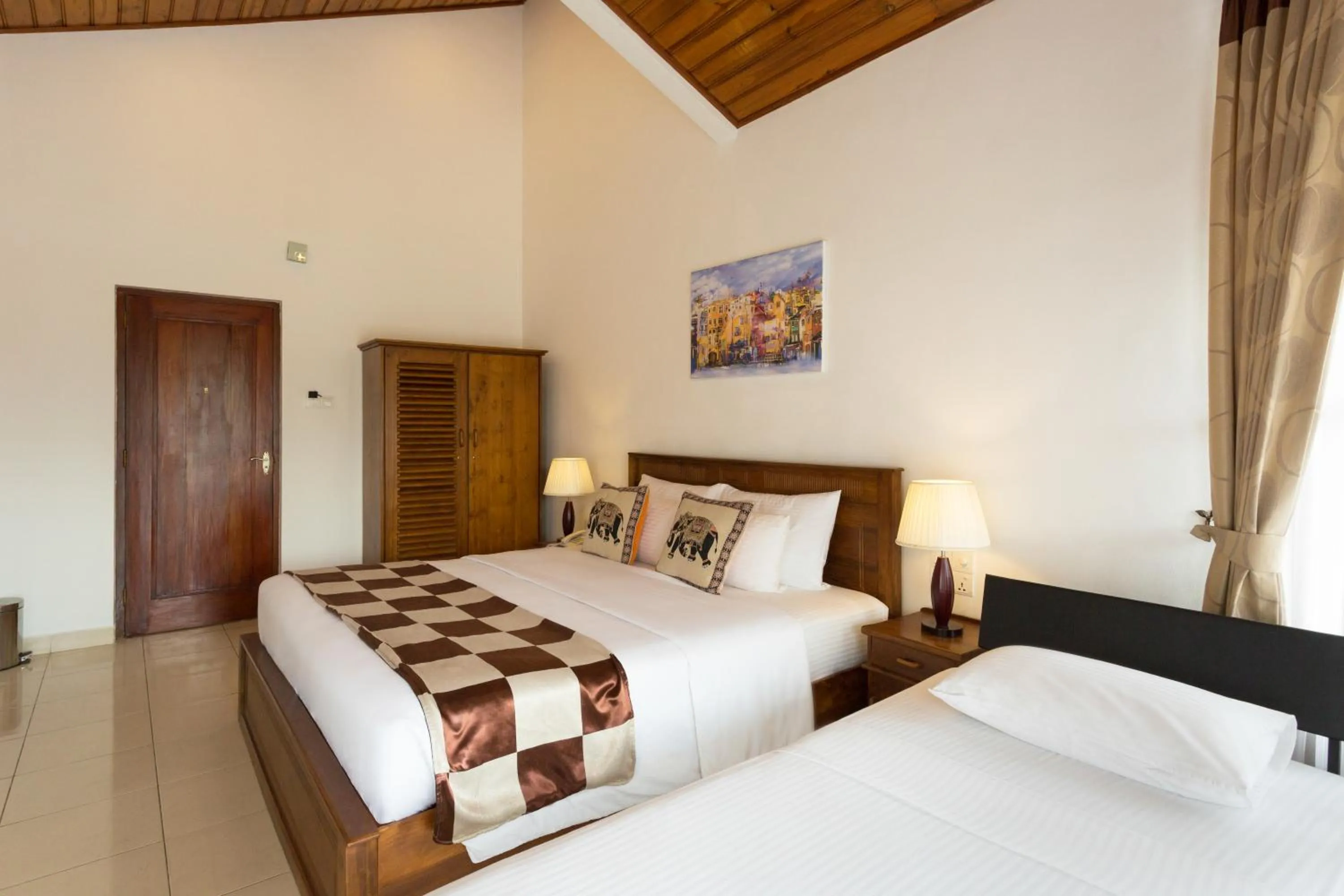 Bed in Orchid Villa Kandy