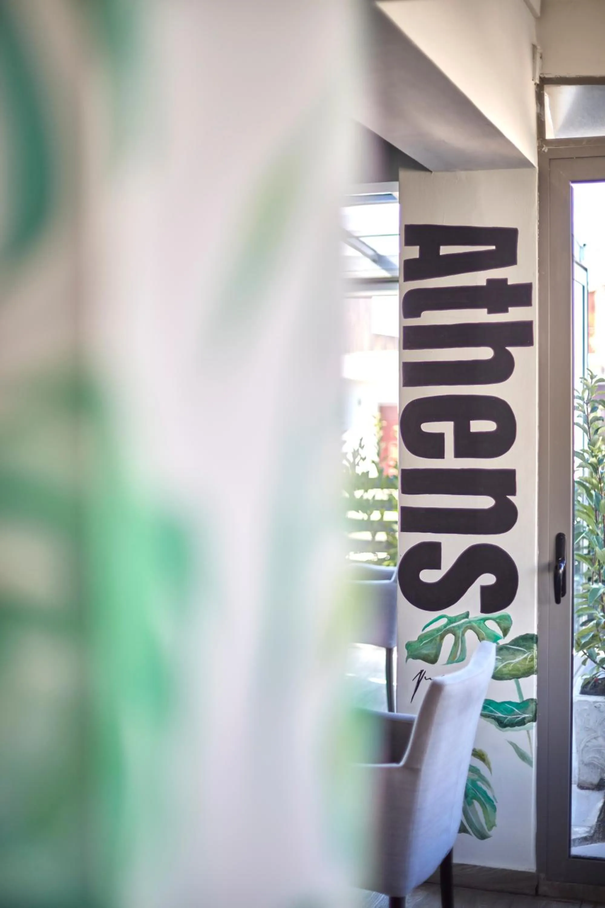 Text overlay in Athens Way Pop Art Hotel