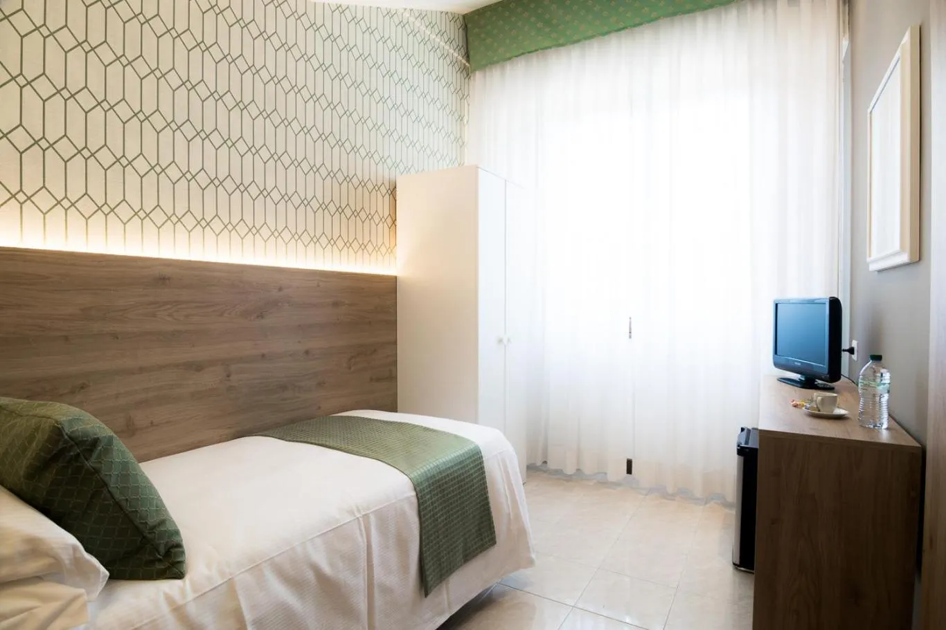 Bed in Hotel Pacific