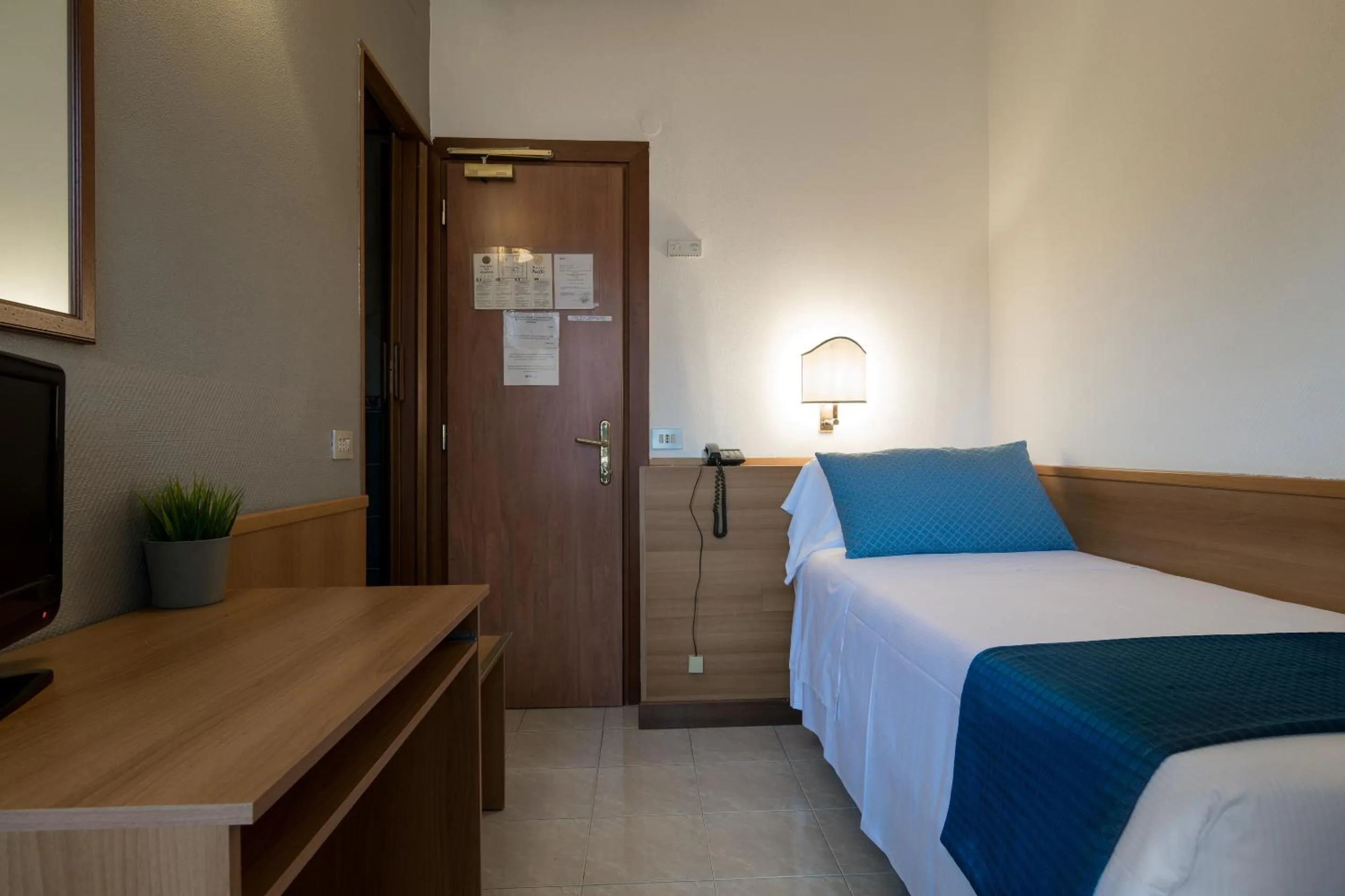 Bed in Hotel Pacific