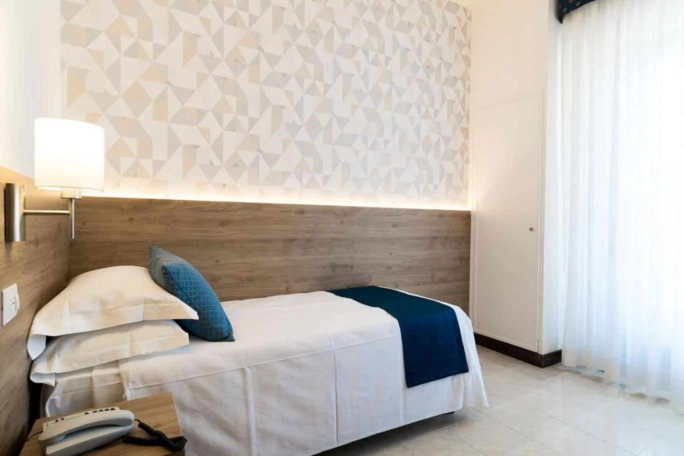 Bed in Hotel Pacific