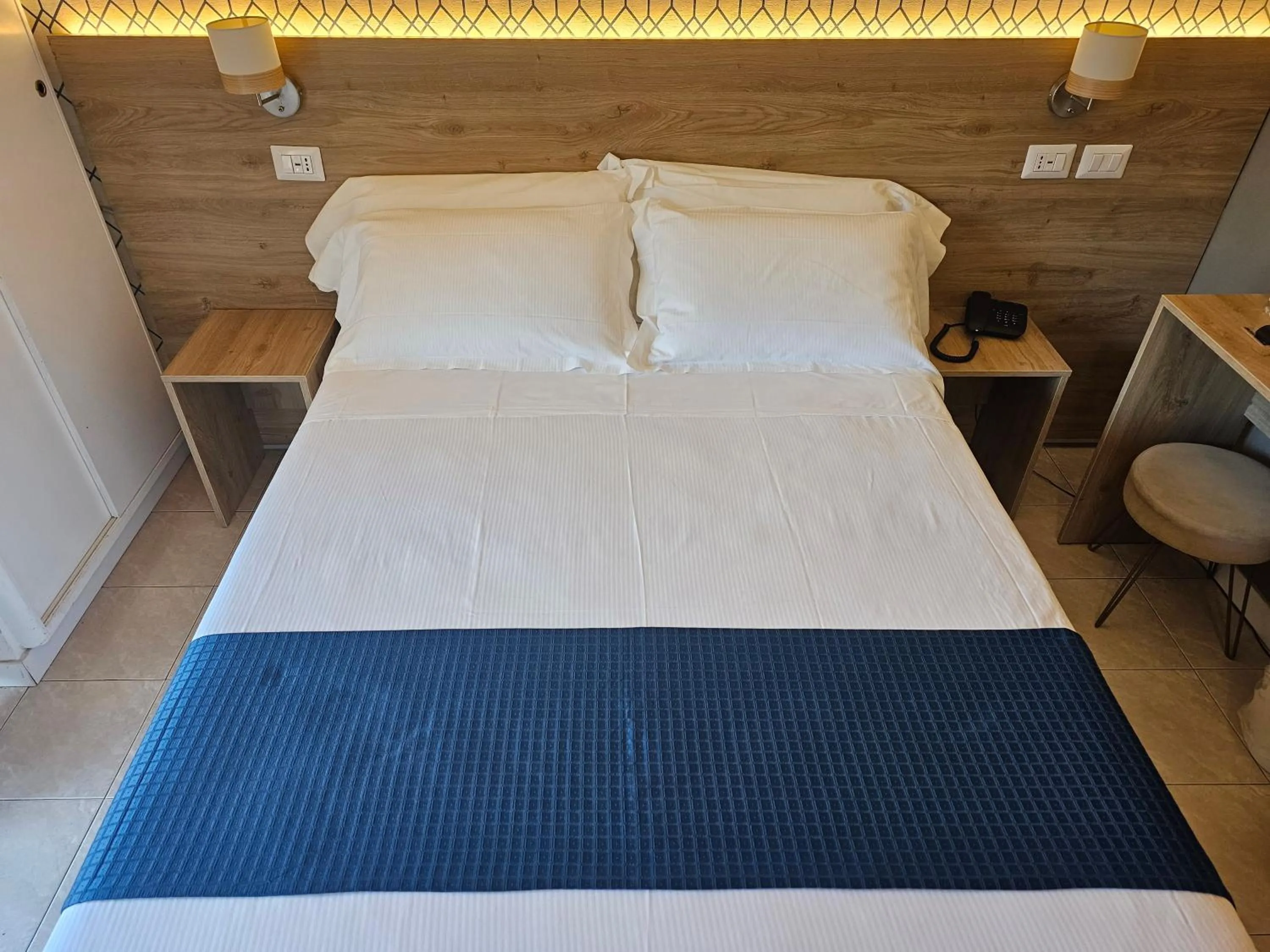 Bed in Hotel Pacific