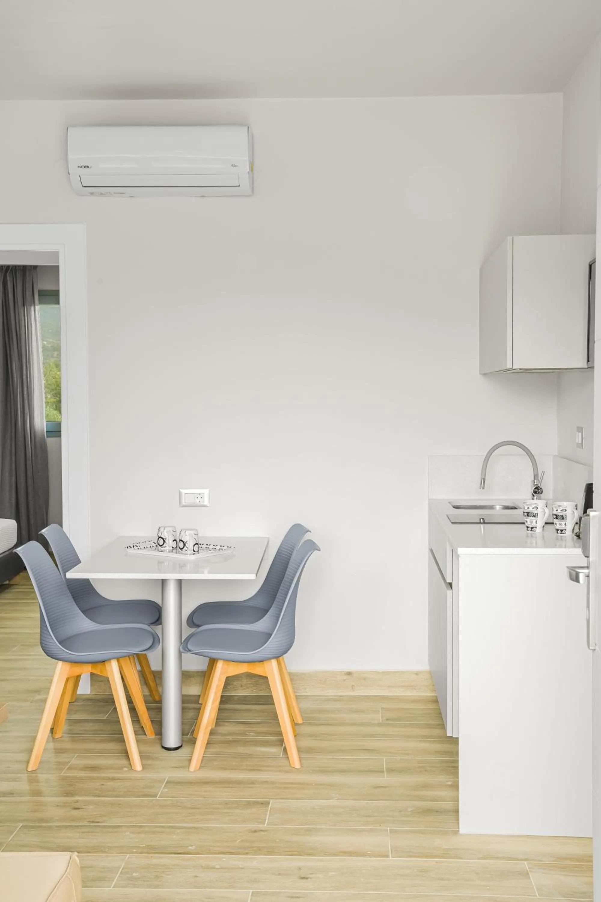 Kitchen or kitchenette in Sergiani Garden Hotel Apartments