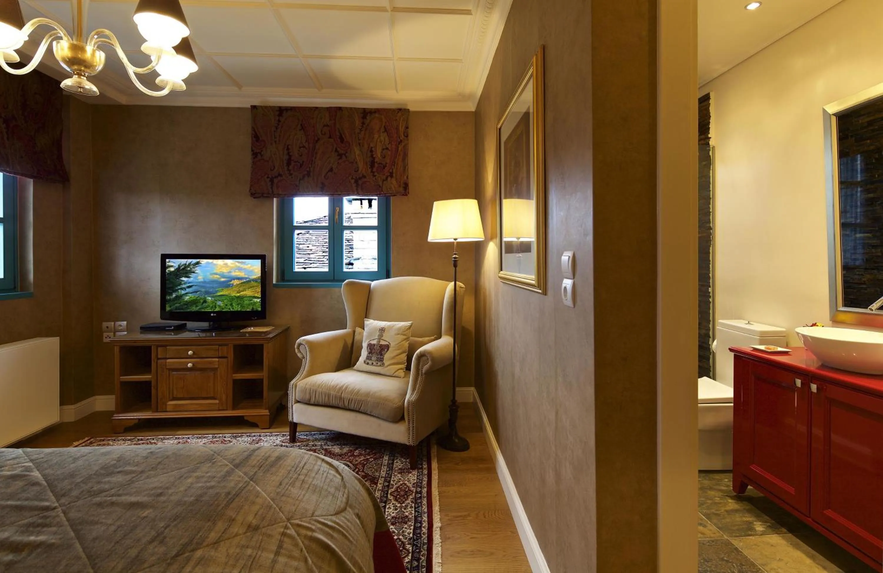 Bed in Zagori Suites Luxury Residences