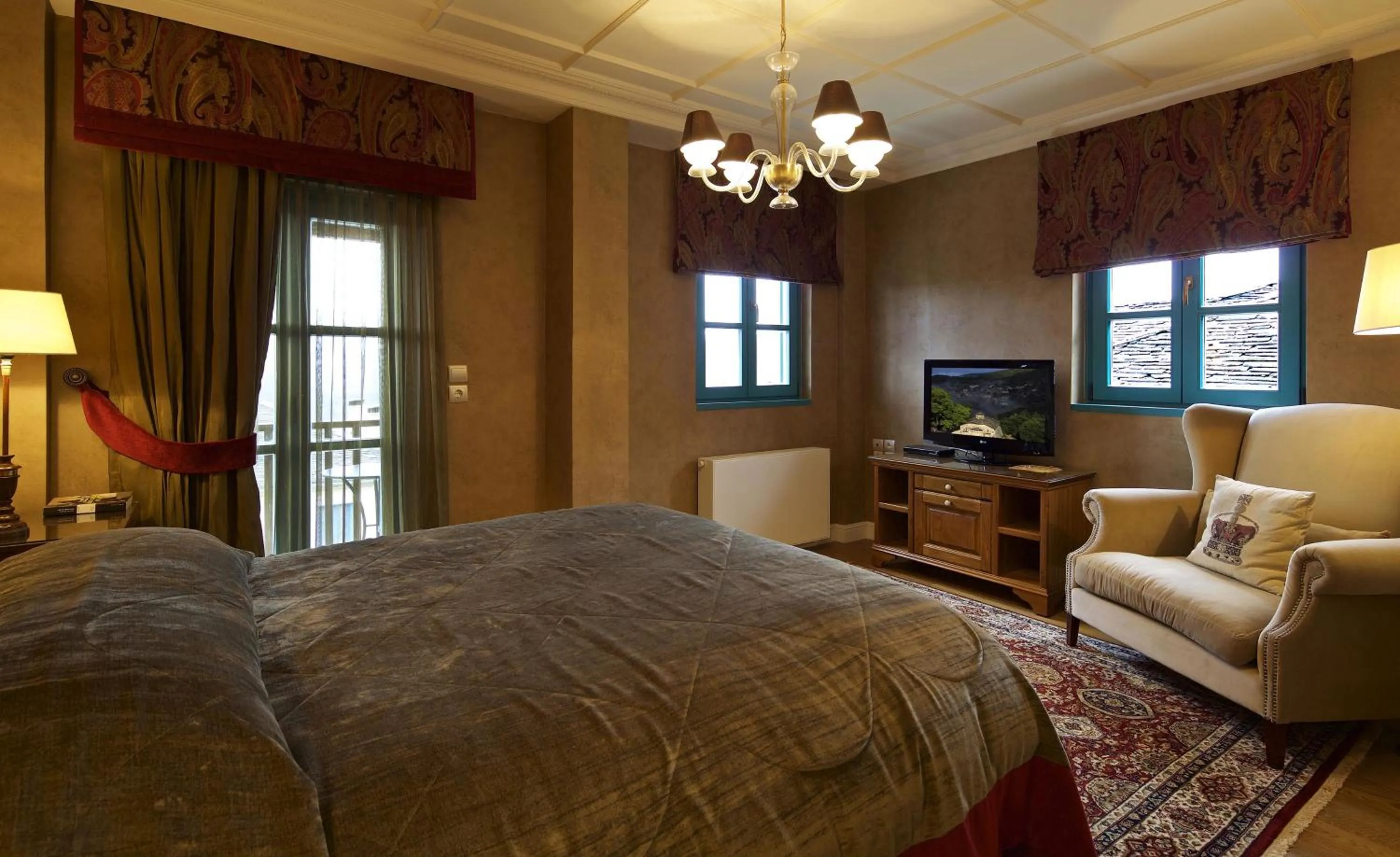 Bed in Zagori Suites Luxury Residences