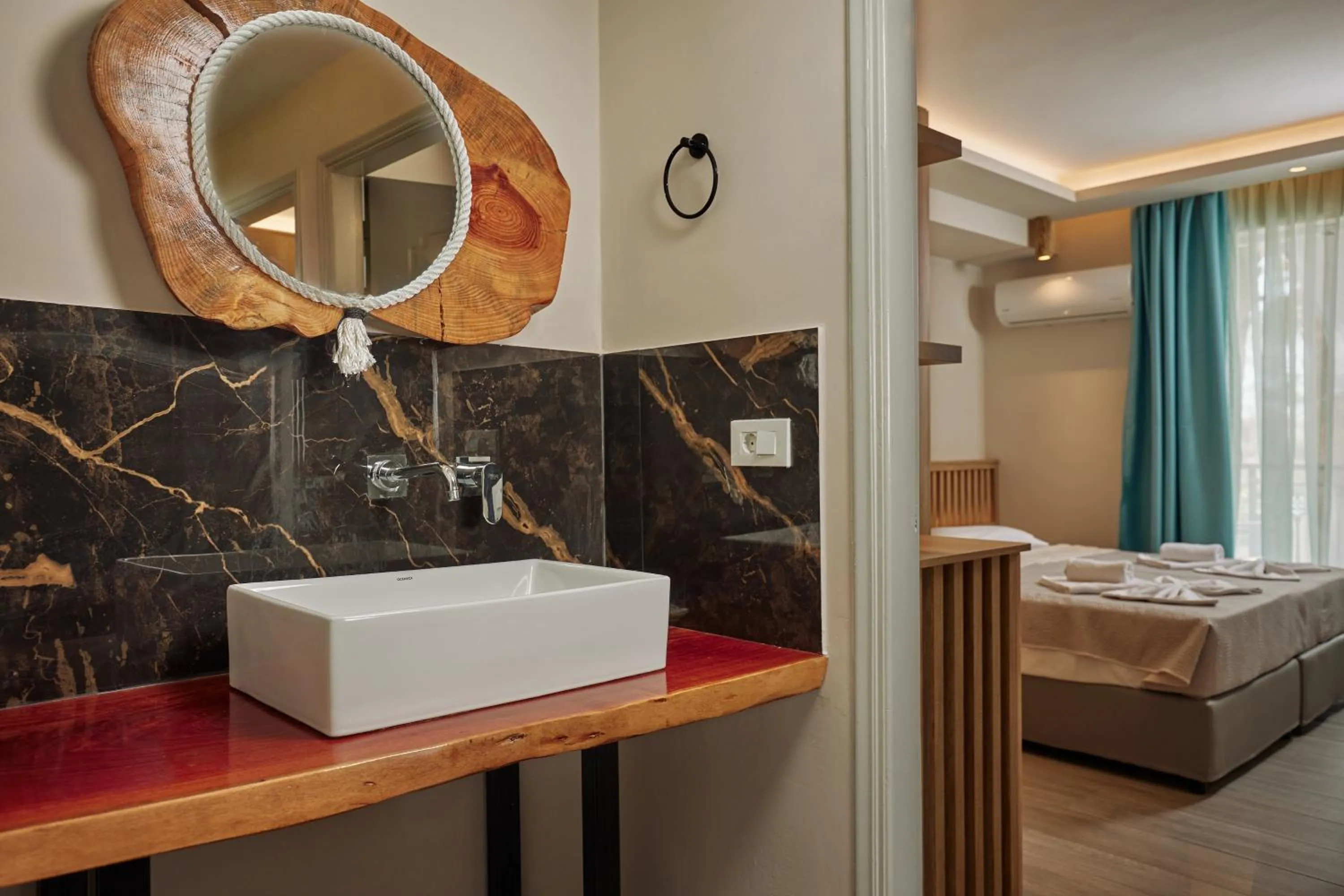 Photo of the whole room, Bed in Iniohos Zante Hotel & Suites