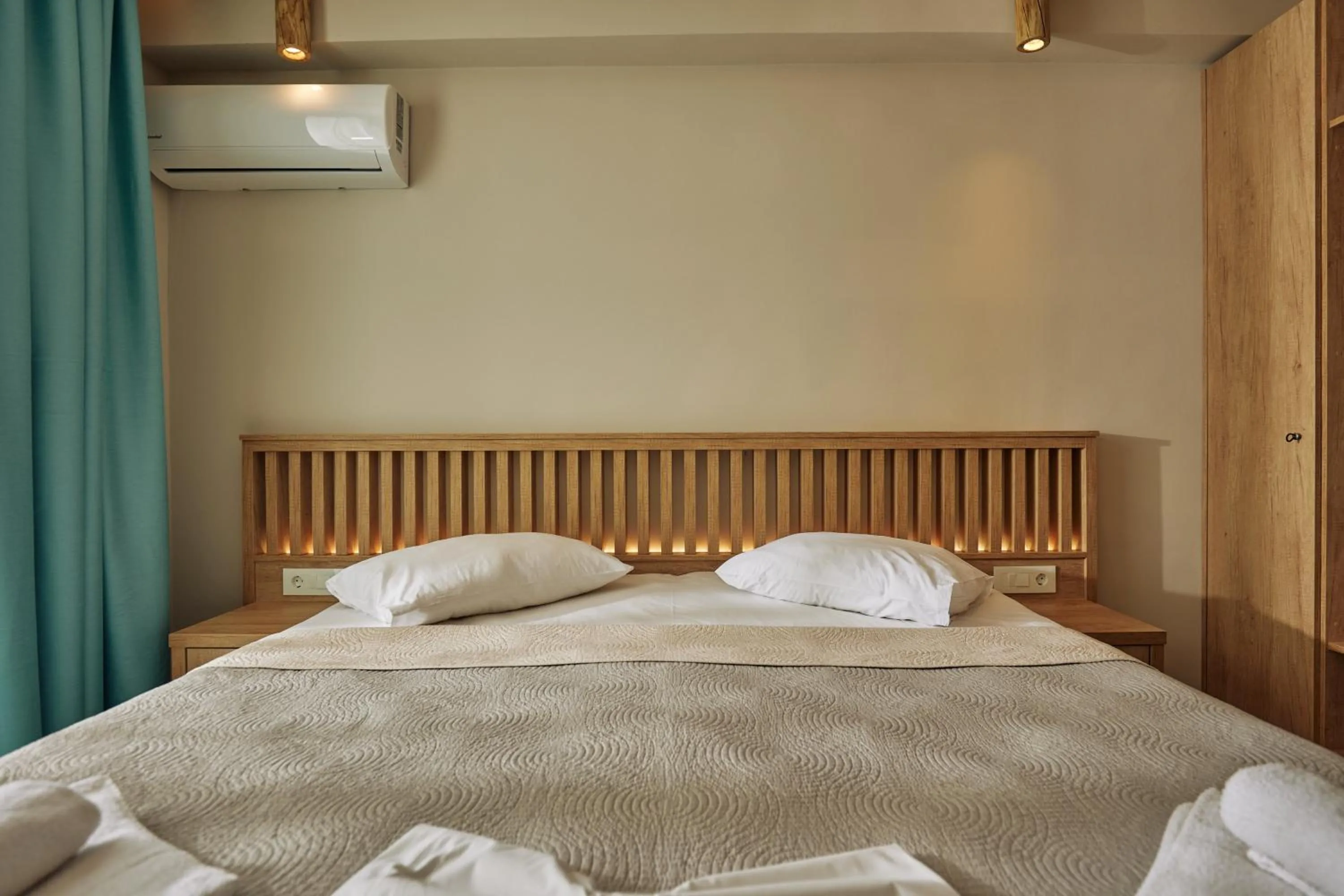 Bed in Iniohos Zante Hotel & Suites