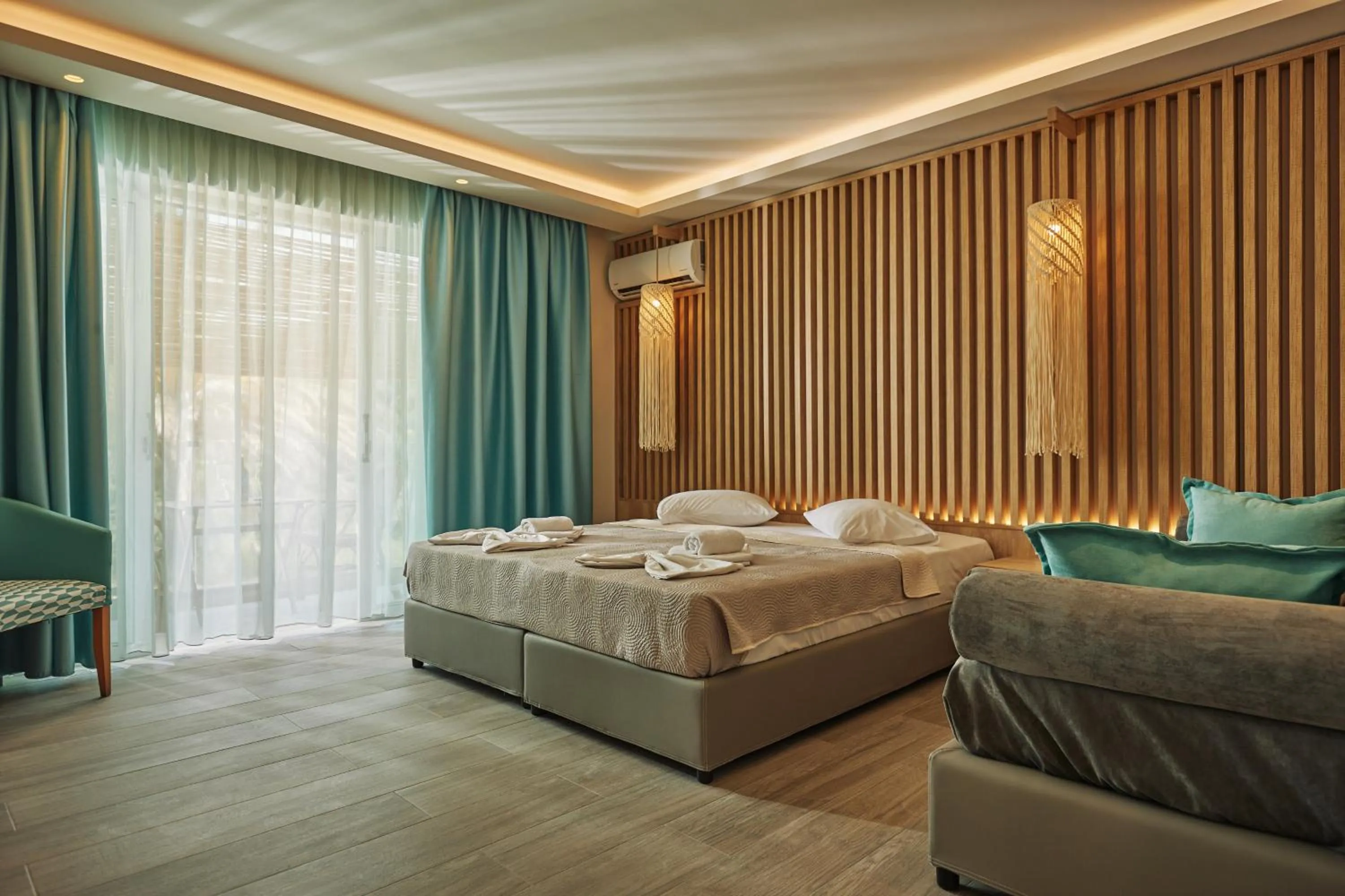 Photo of the whole room, Bed in Iniohos Zante Hotel & Suites