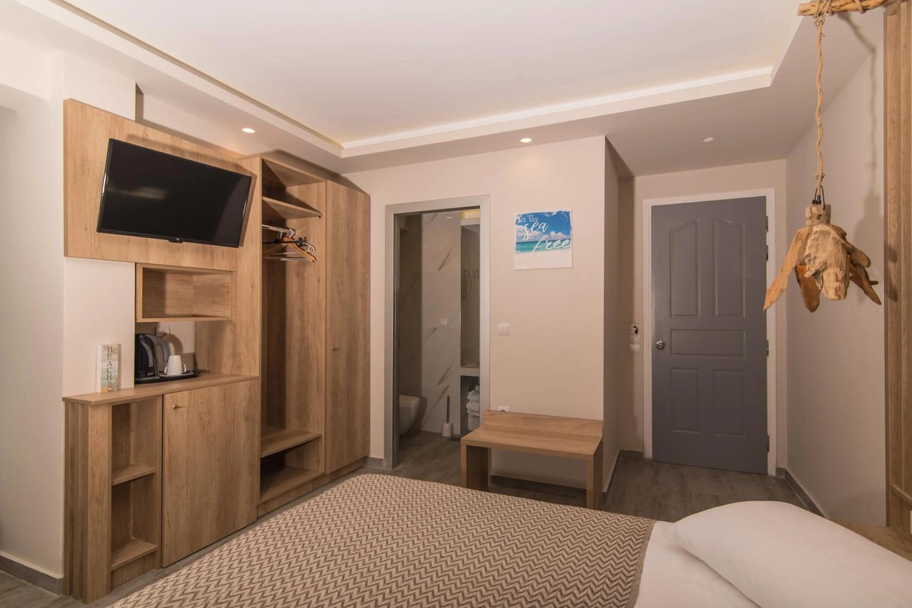 Photo of the whole room, Bed in Iniohos Zante Hotel & Suites