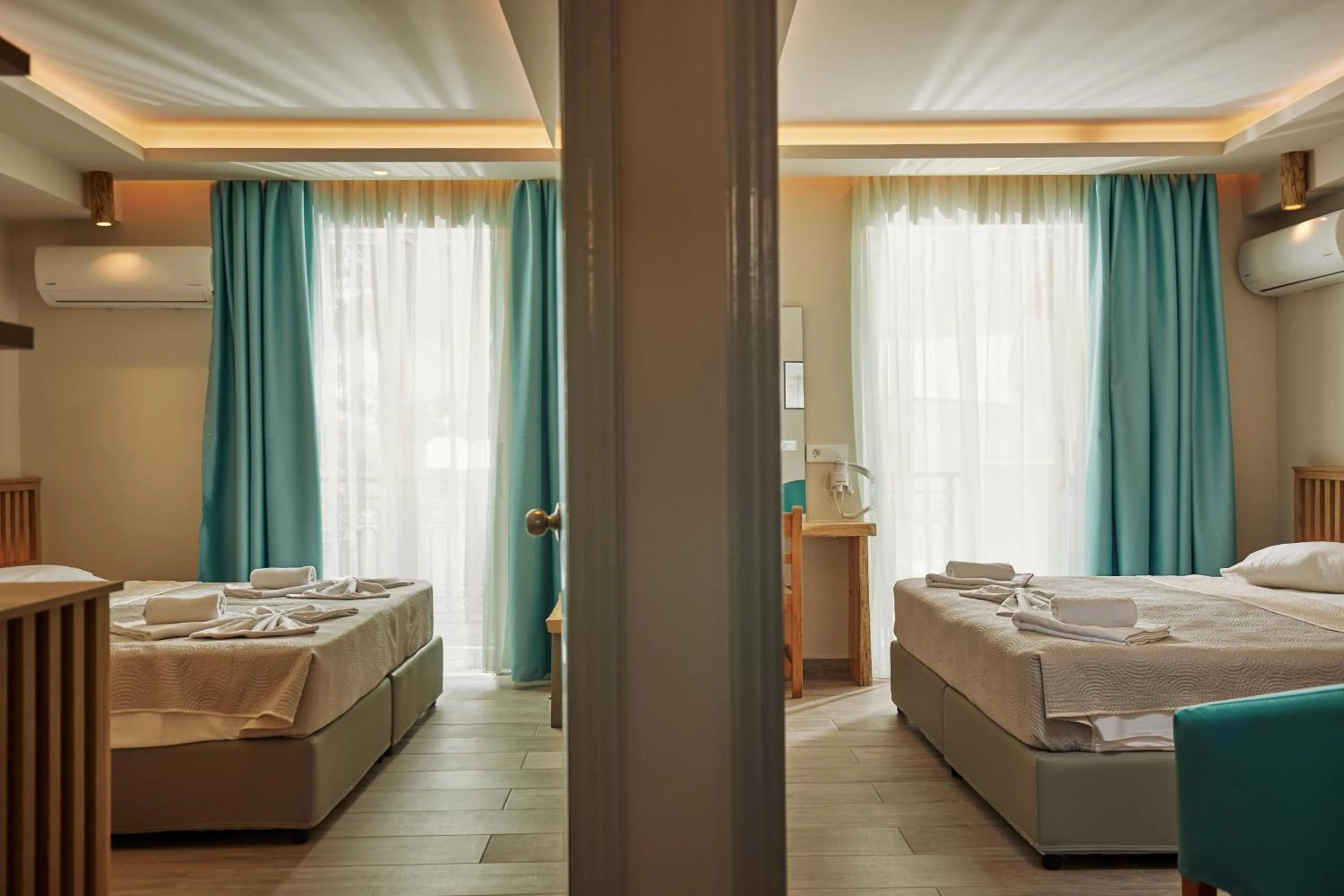 Photo of the whole room, Bed in Iniohos Zante Hotel & Suites