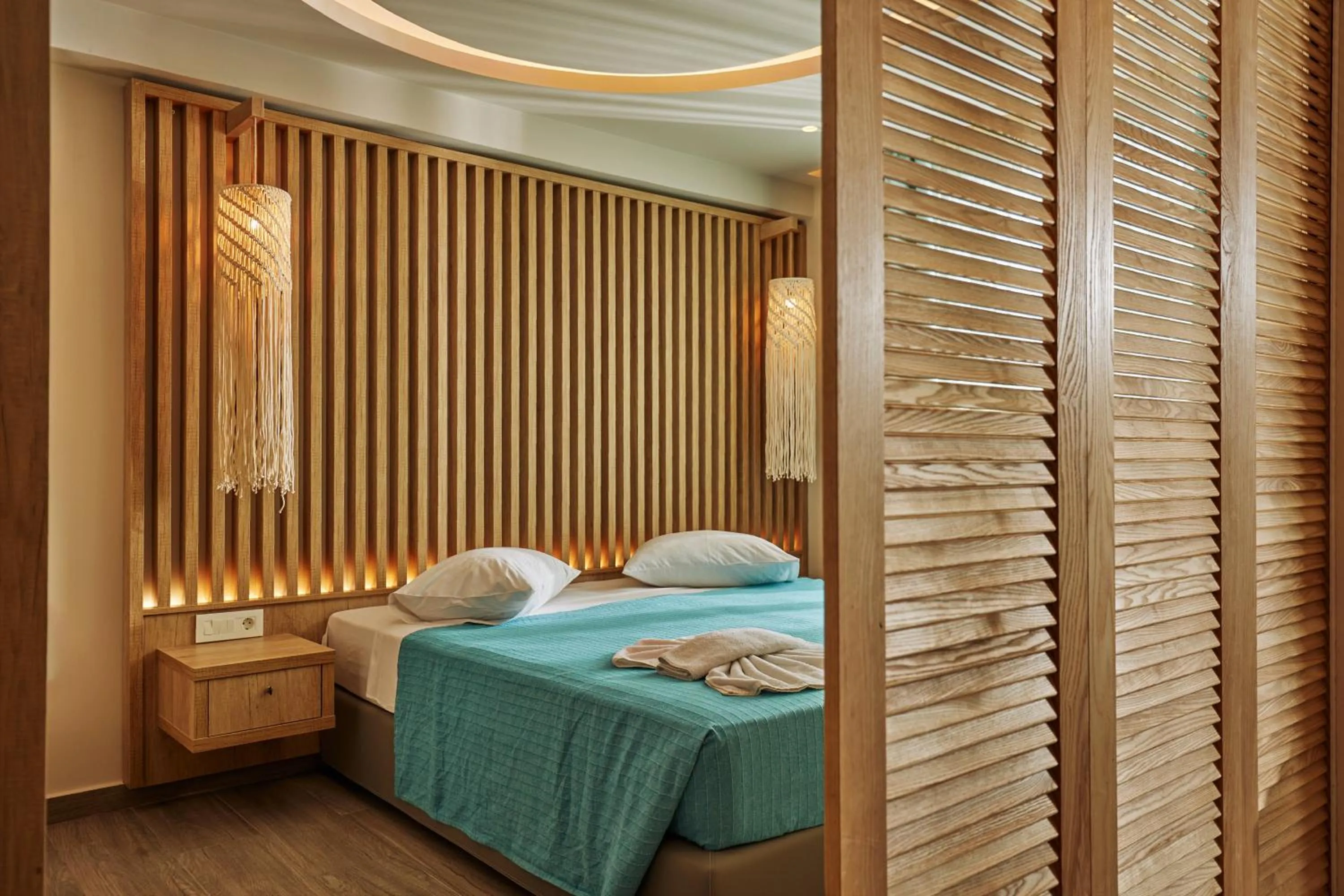 Photo of the whole room, Bed in Iniohos Zante Hotel & Suites