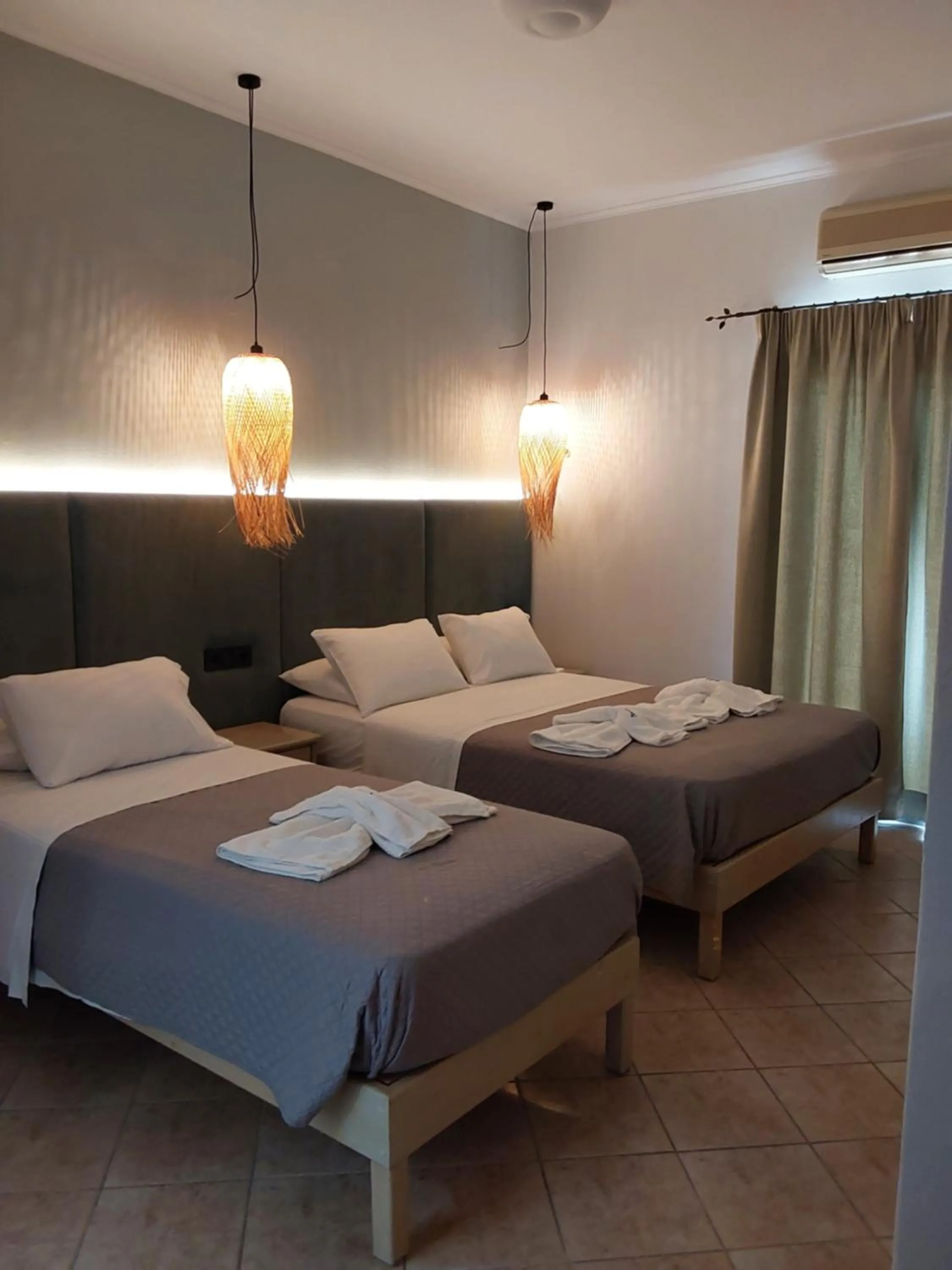 Bedroom, Bed in Ninos On The Beach Hotel