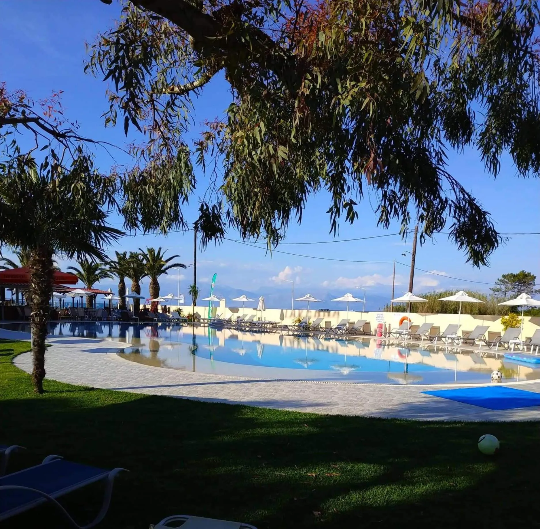 Swimming pool in Ninos On The Beach Hotel