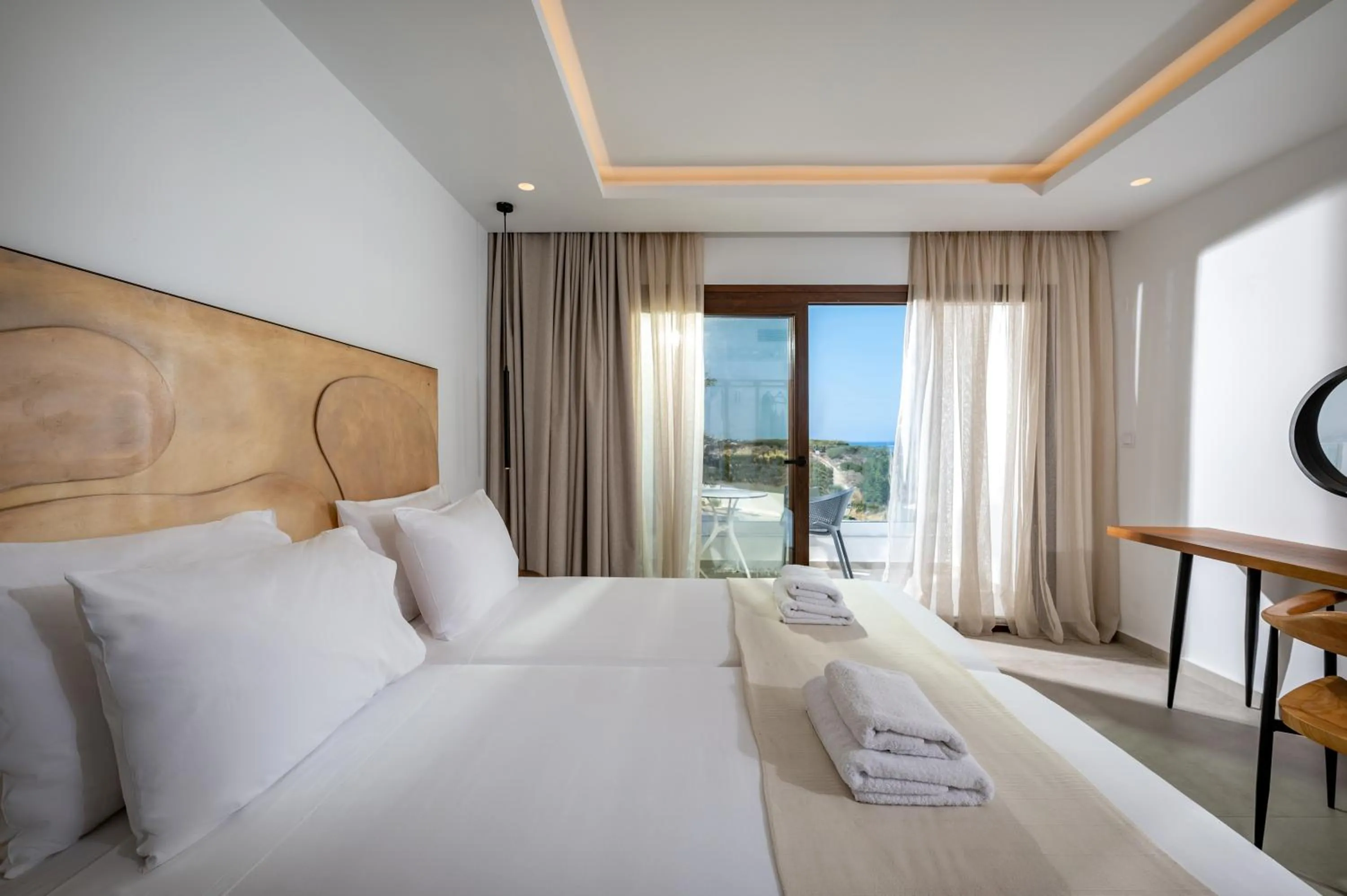 Bed in Mika Villas & Suites