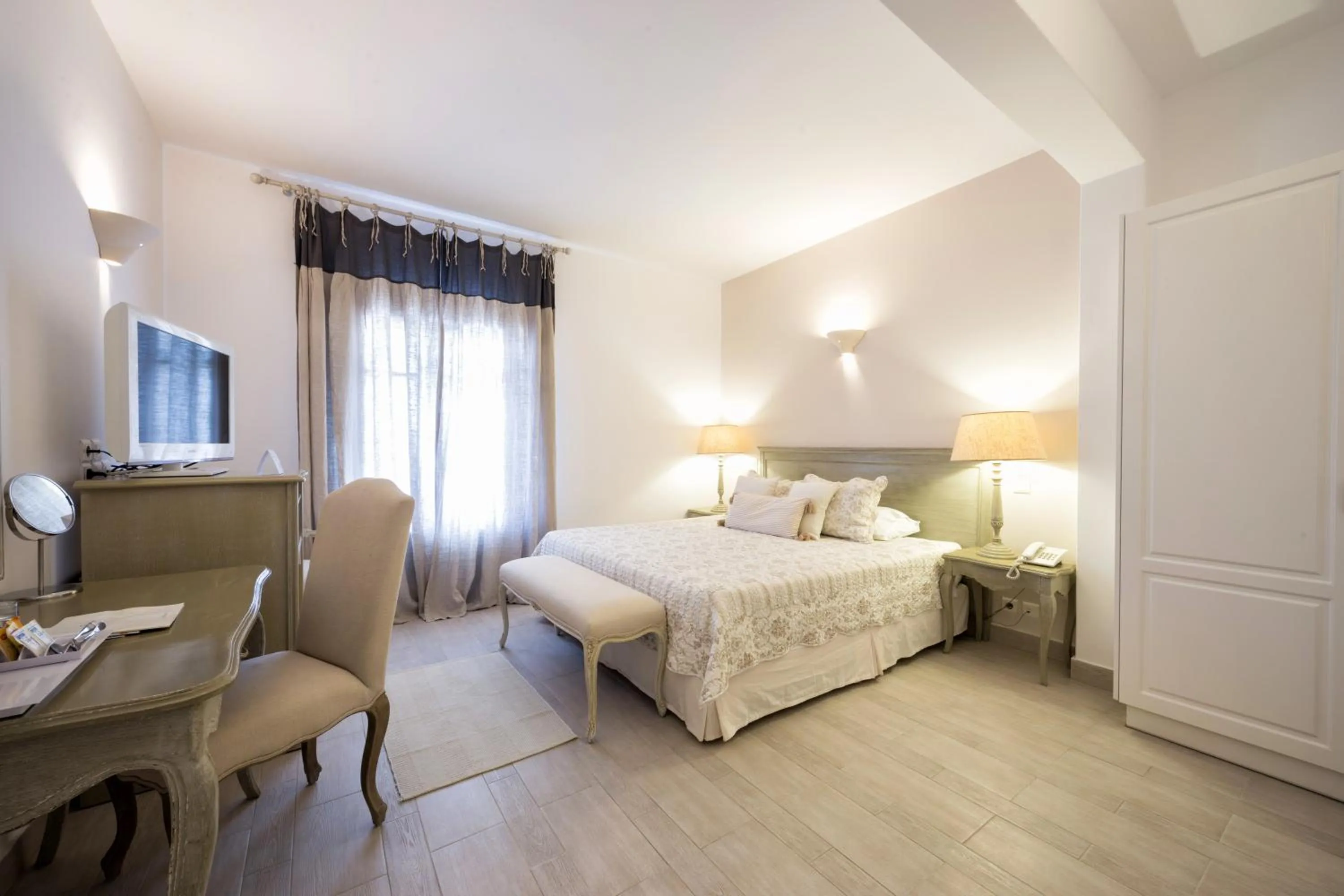 Bed in Saint Andrea Seaside Resort - Adults Only