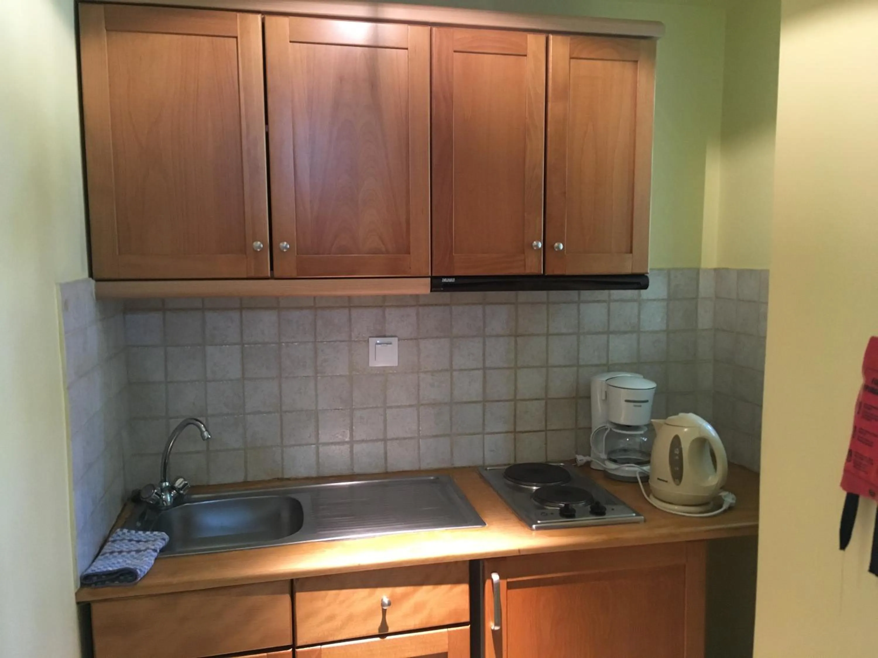 Kitchen or kitchenette in Jason Hotel Apartments