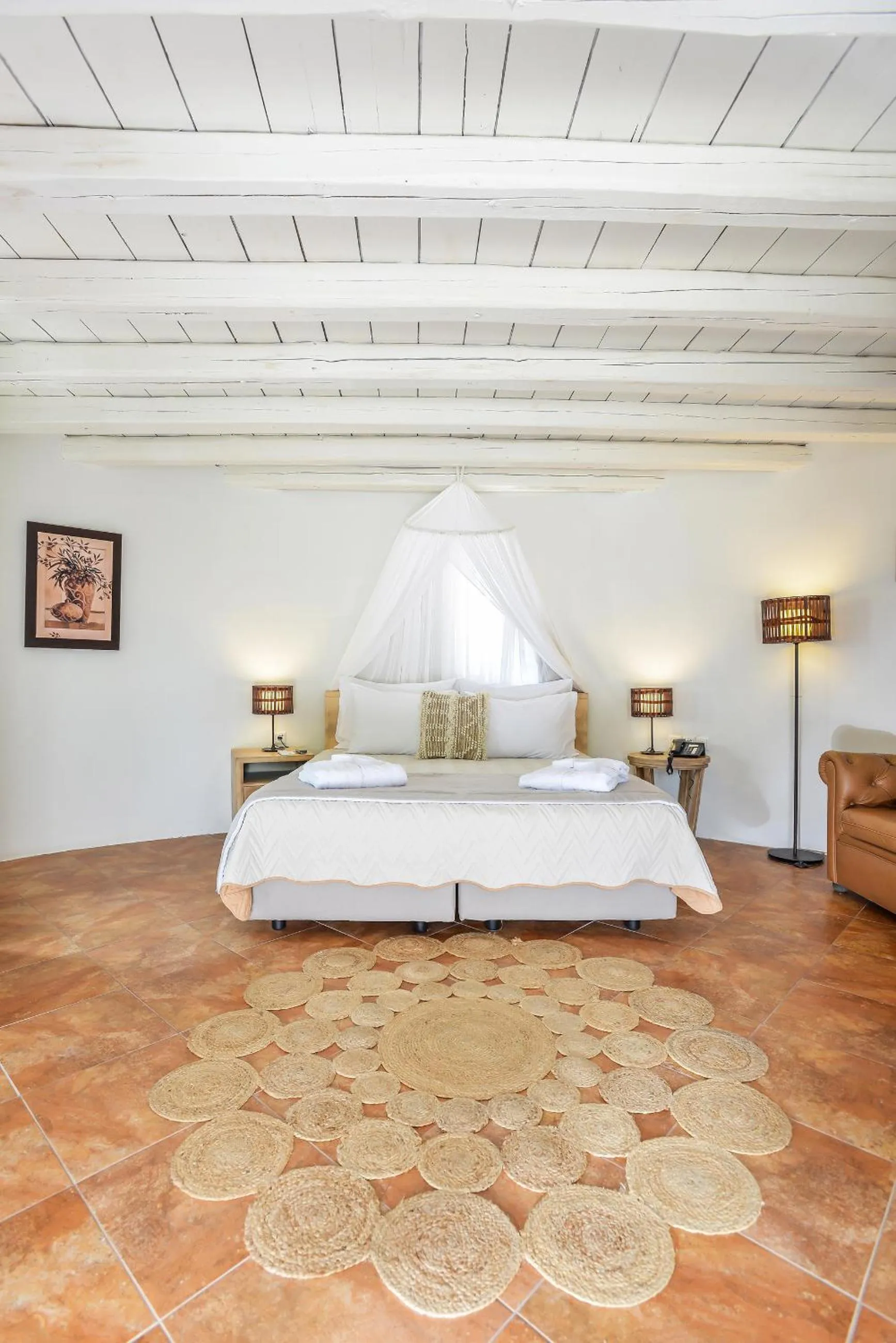 Bed in Varos Village Boutique Hotel