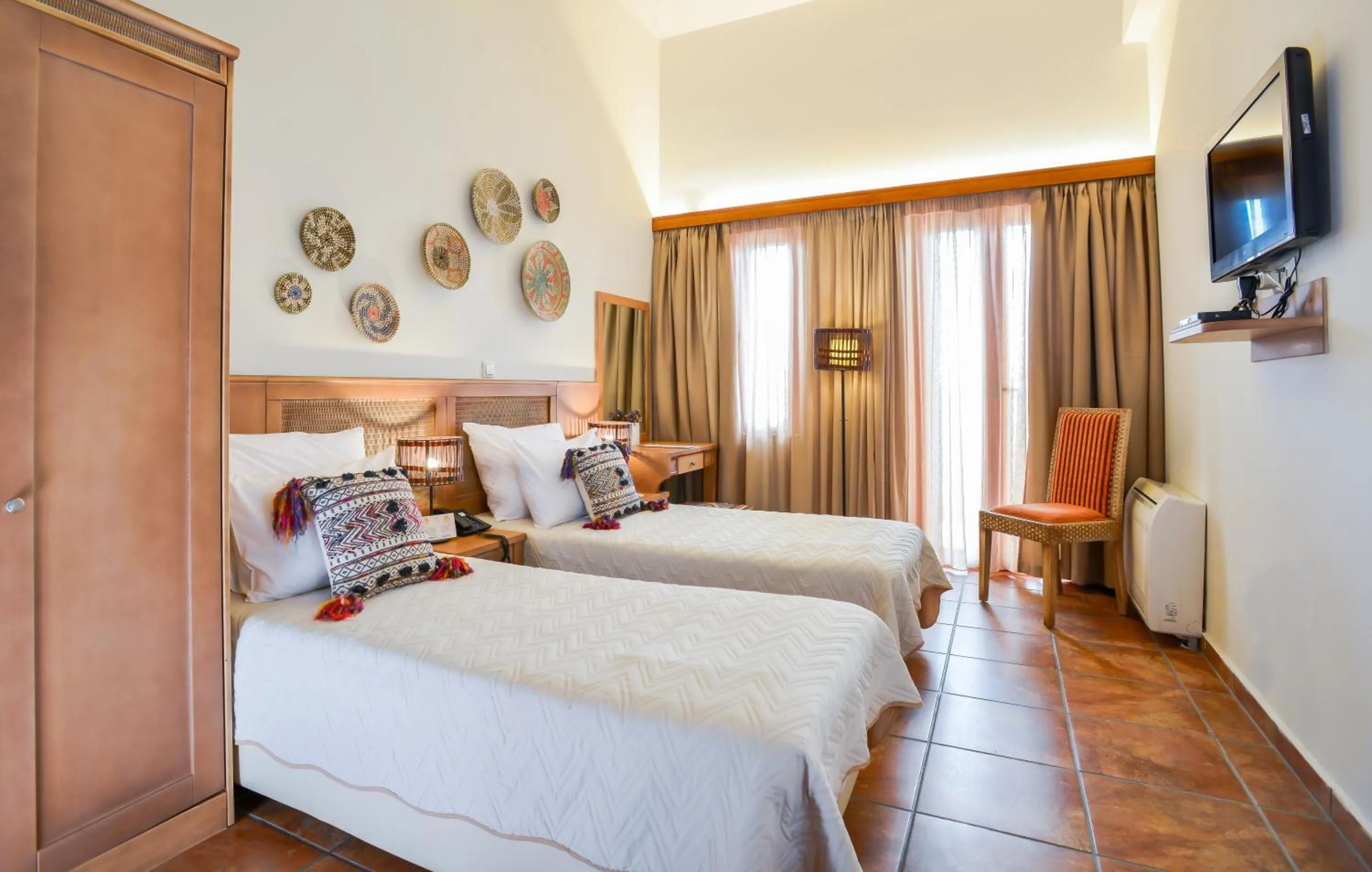 Bed in Varos Village Boutique Hotel