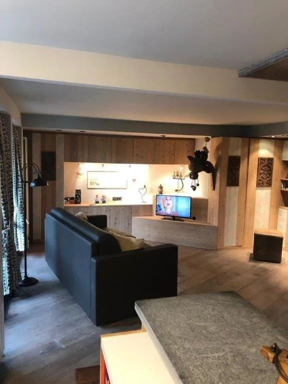 Living room in Aux Pieds du Roi - Suite & Spa