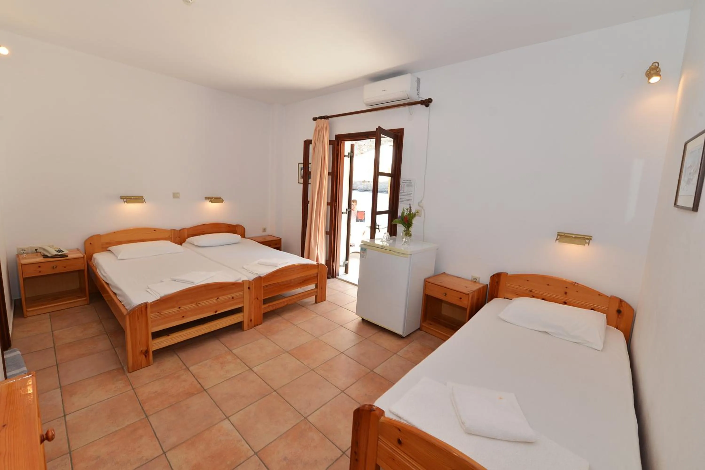 Bed in Ikaros Star Hotel