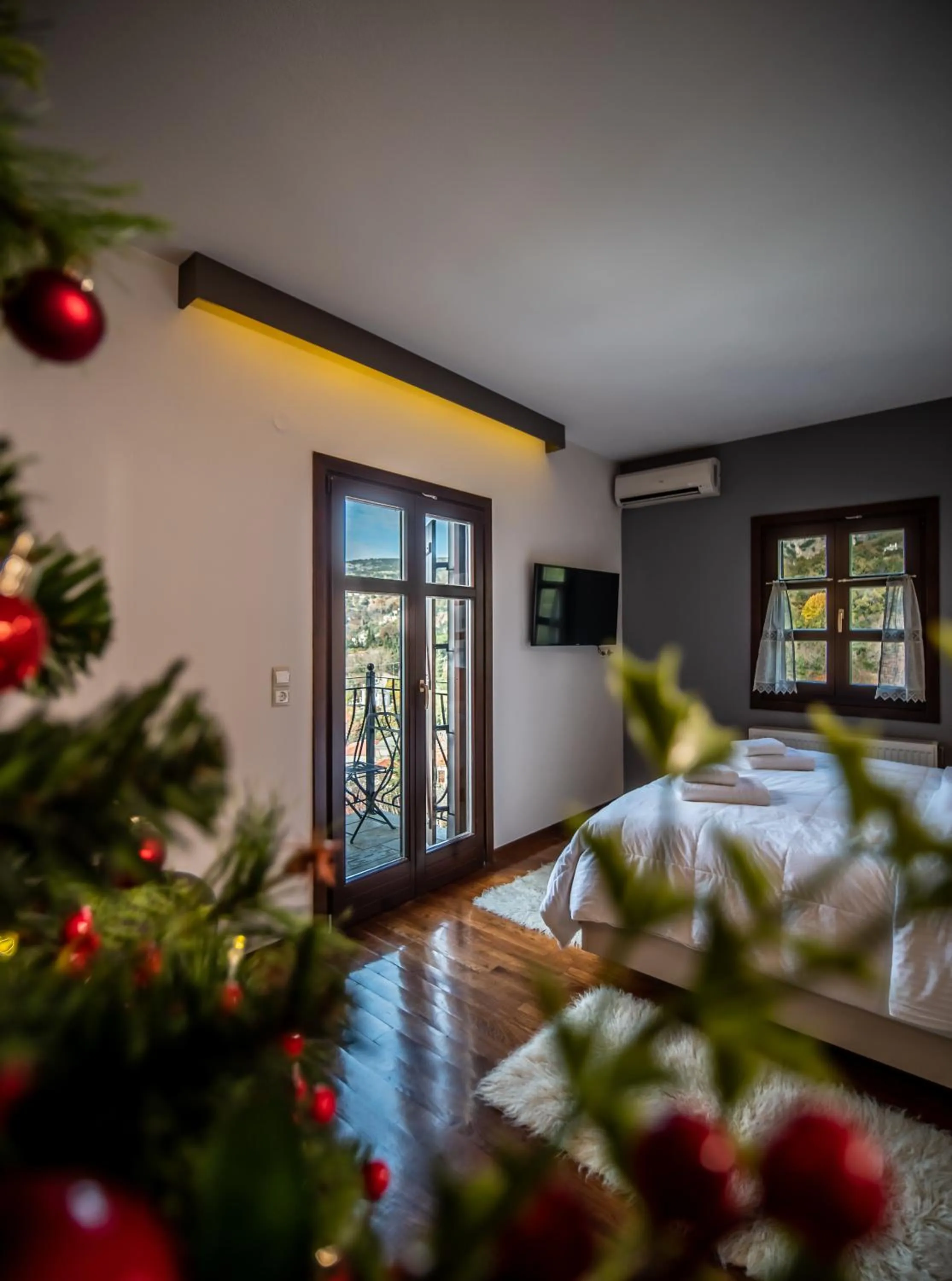 Bed in Erofili Hotel & Suites