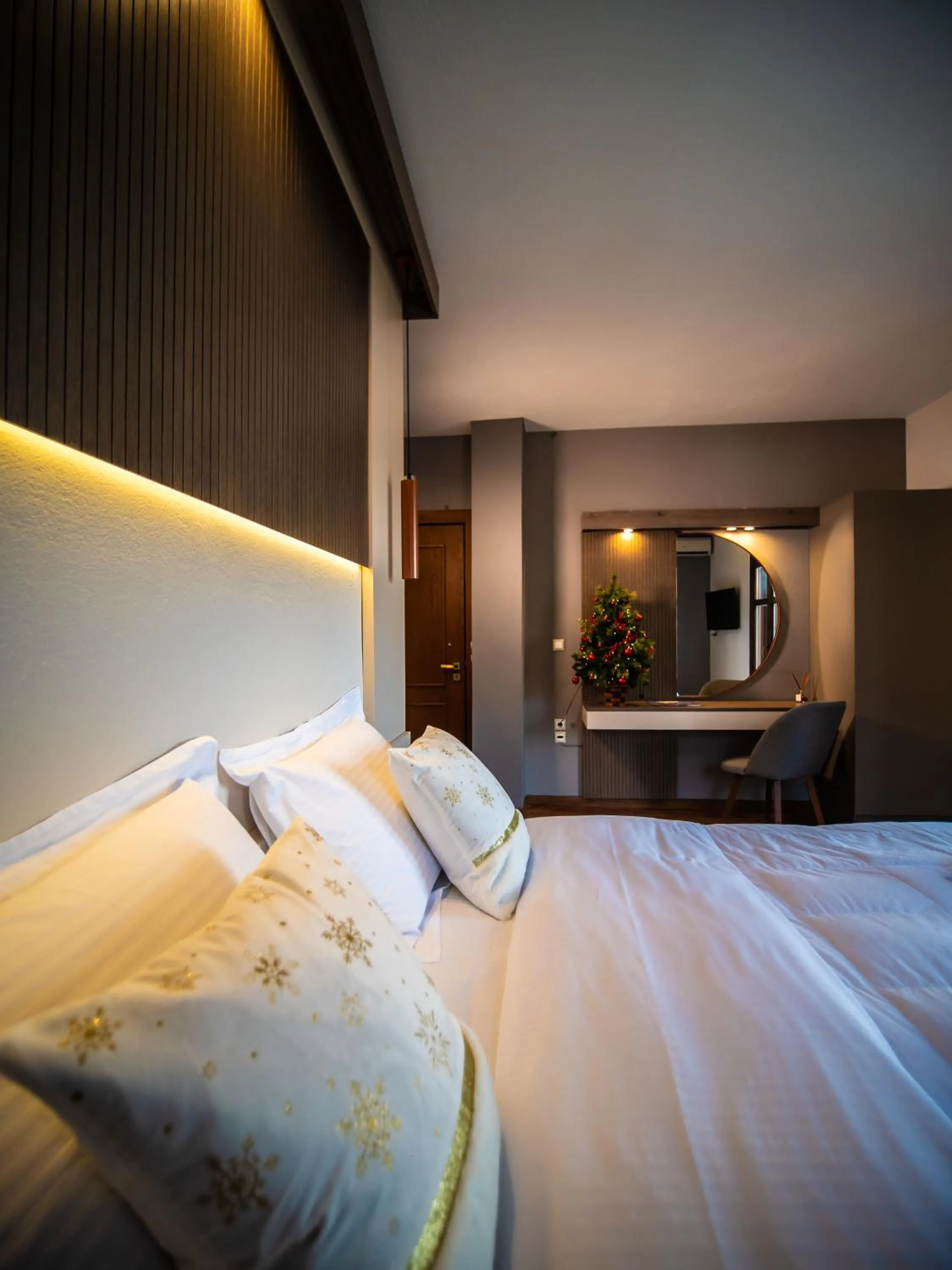 Bed in Erofili Hotel & Suites