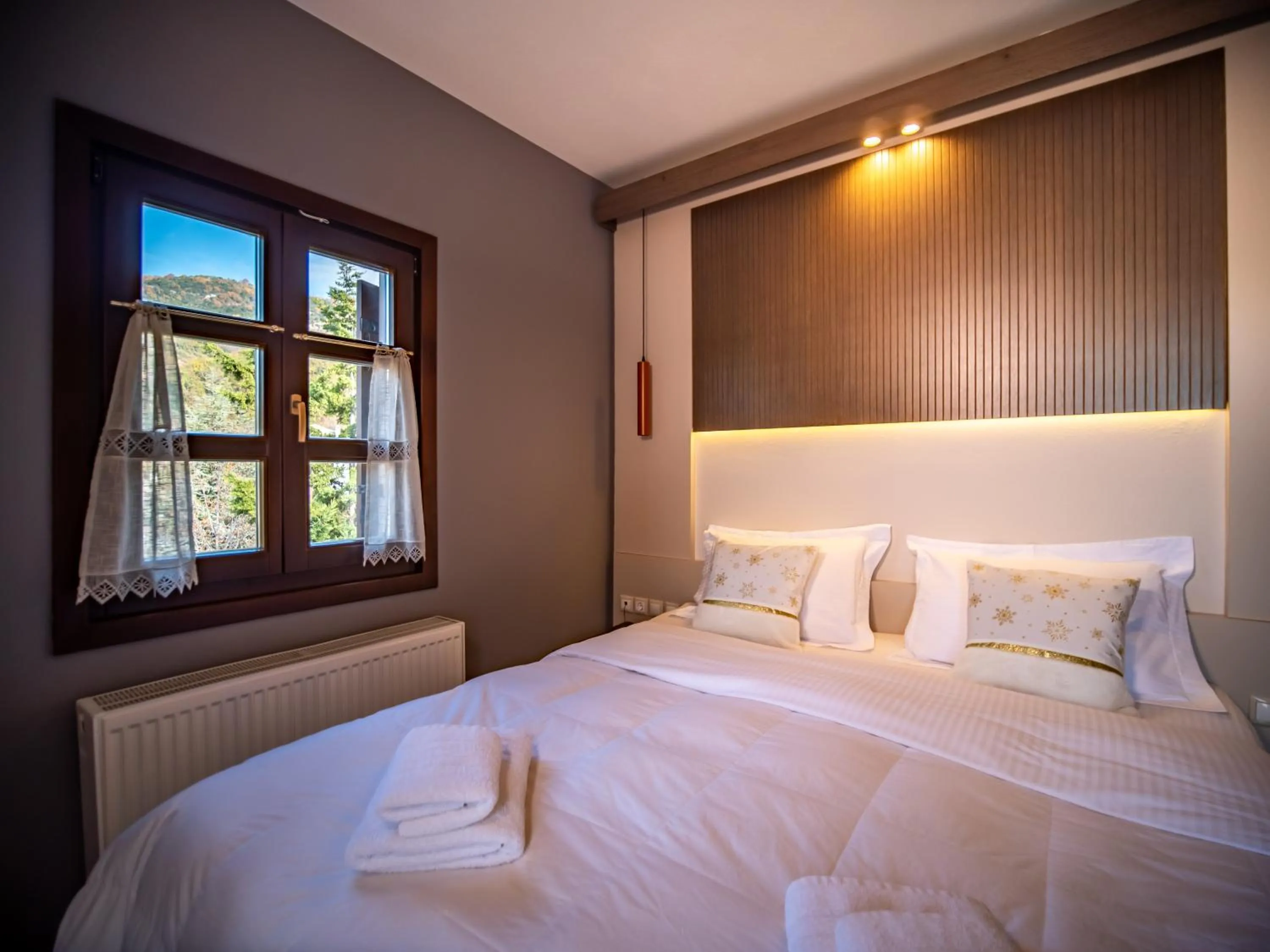 Bed in Erofili Hotel & Suites